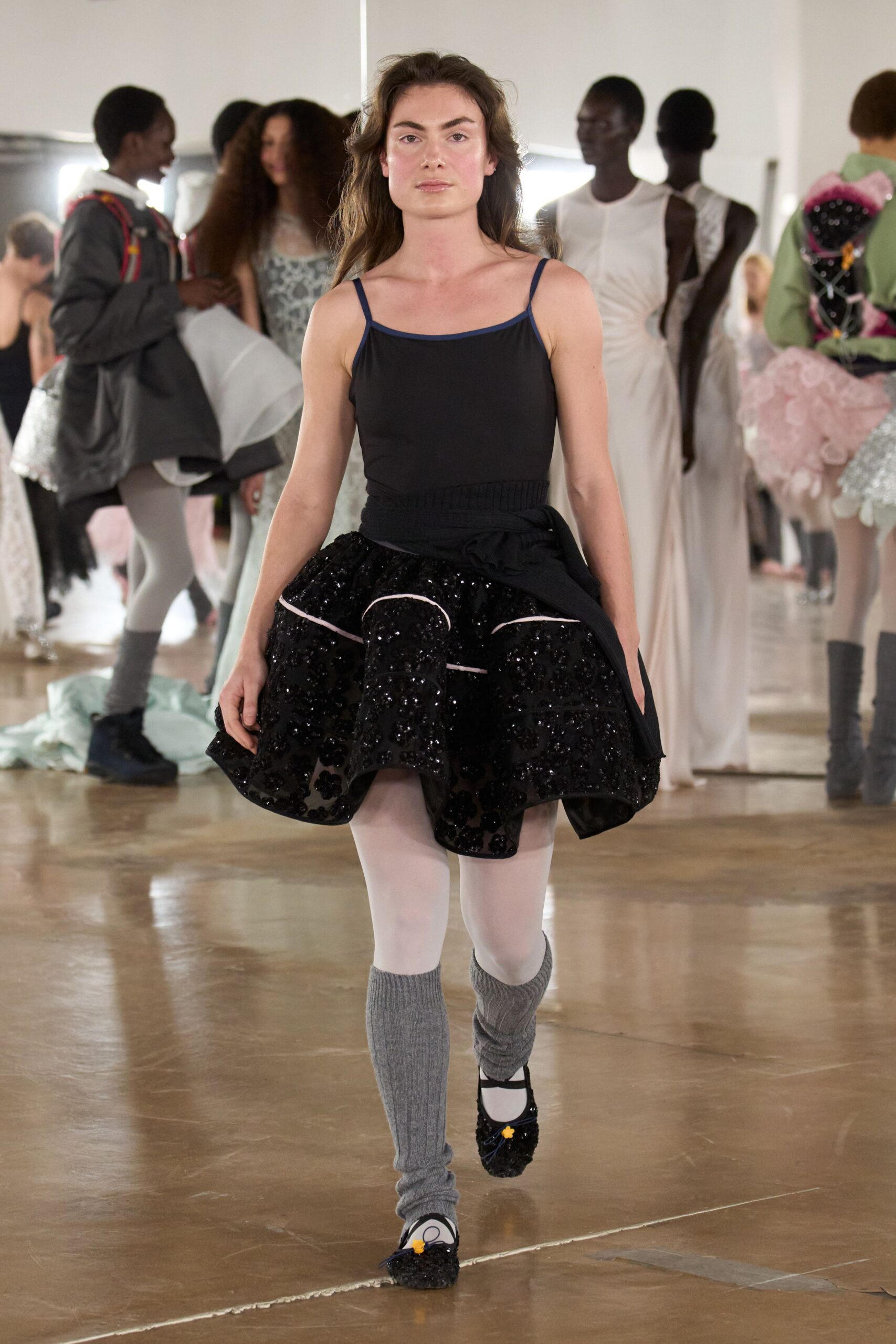 black fitted top with tiered skirt