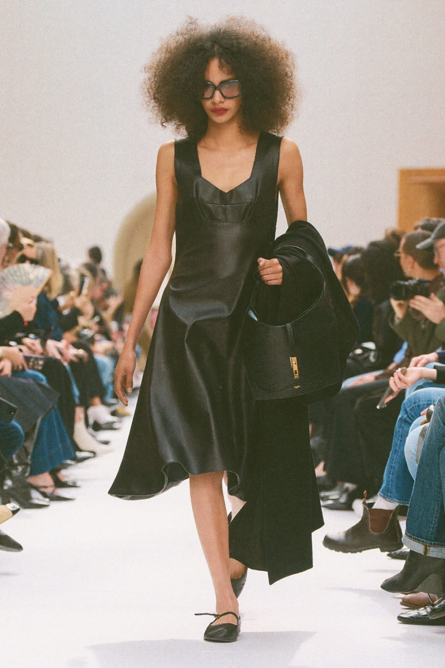 black silk sleeveless v-neck fitted a-line flowing dress