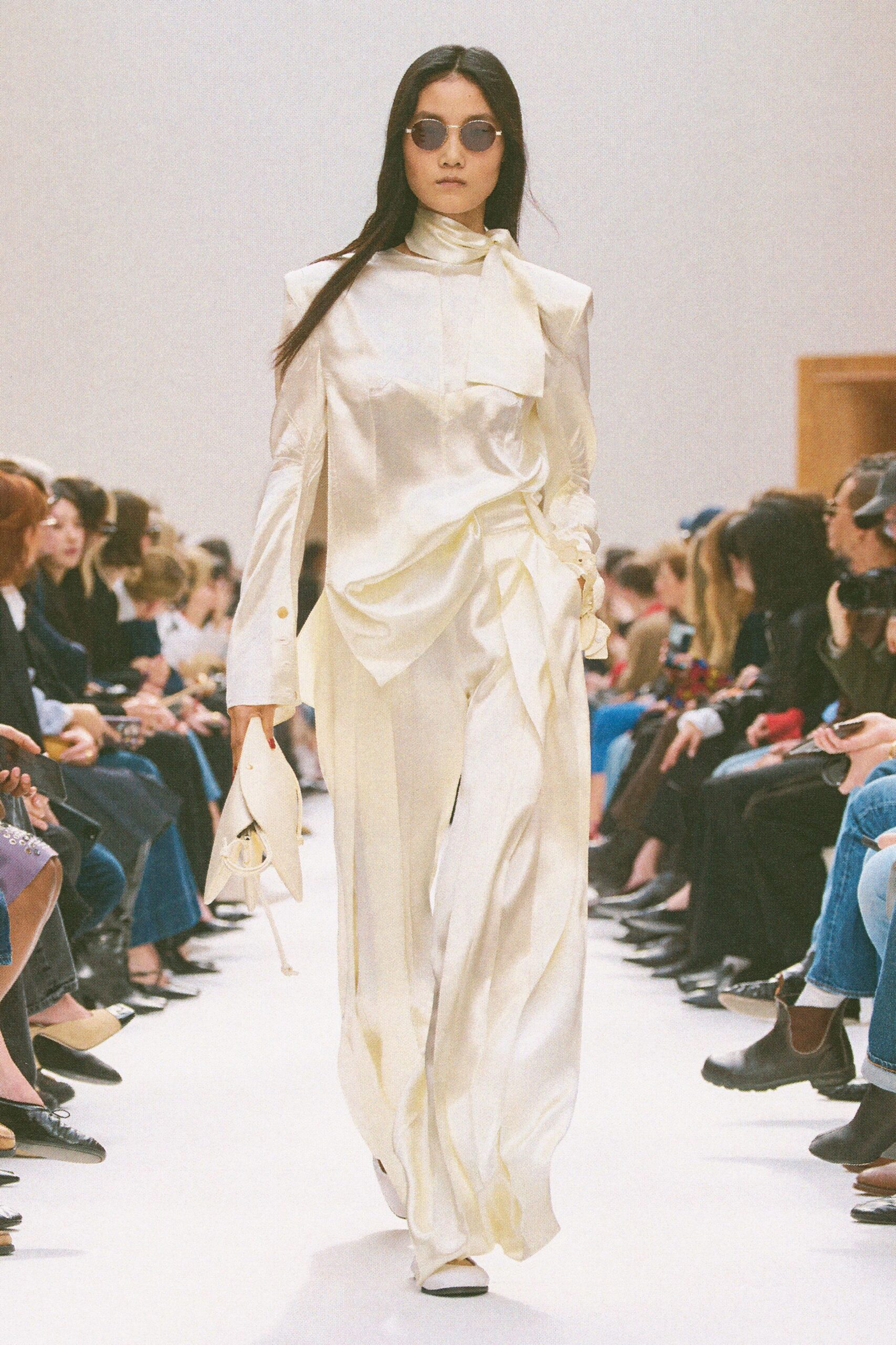 white silk long-sleeve collared fitted draped zippered suit