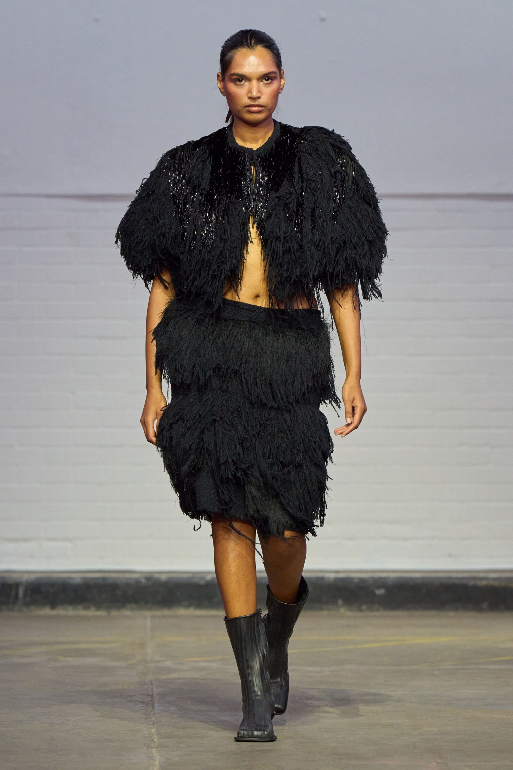 black fur sleeveless fitted fringed top