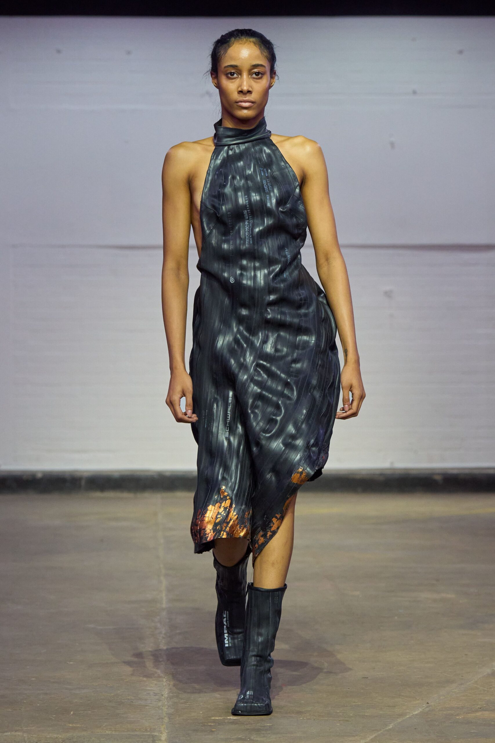 black silk sleeveless high-neck fitted draped flowing dress