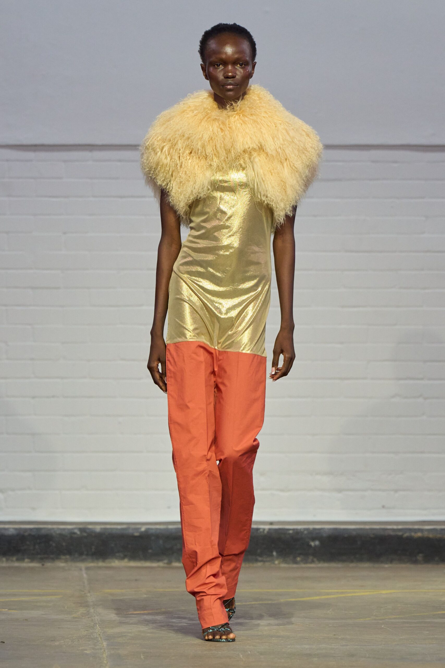 gold silk sleeveless high-neck fitted shiny top