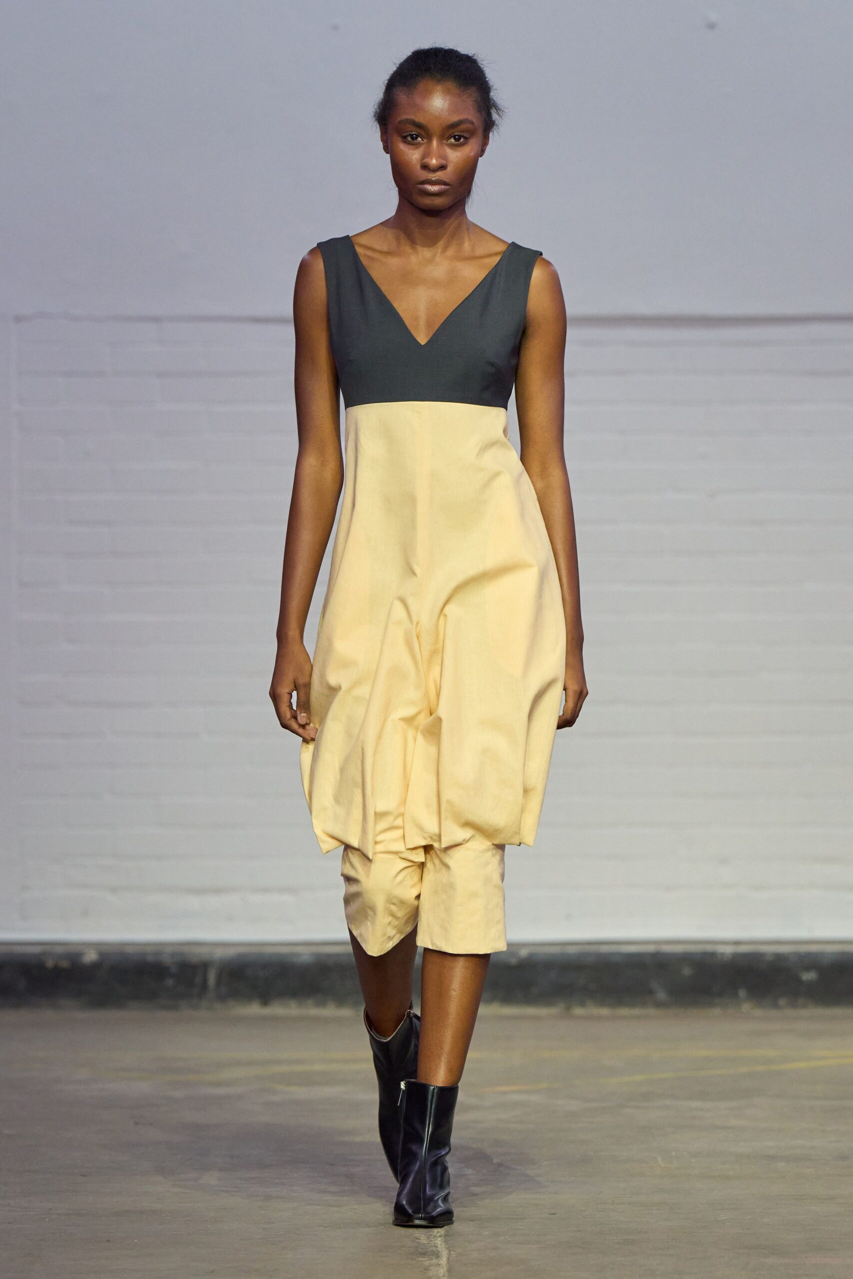 black and yellow sleeveless dress