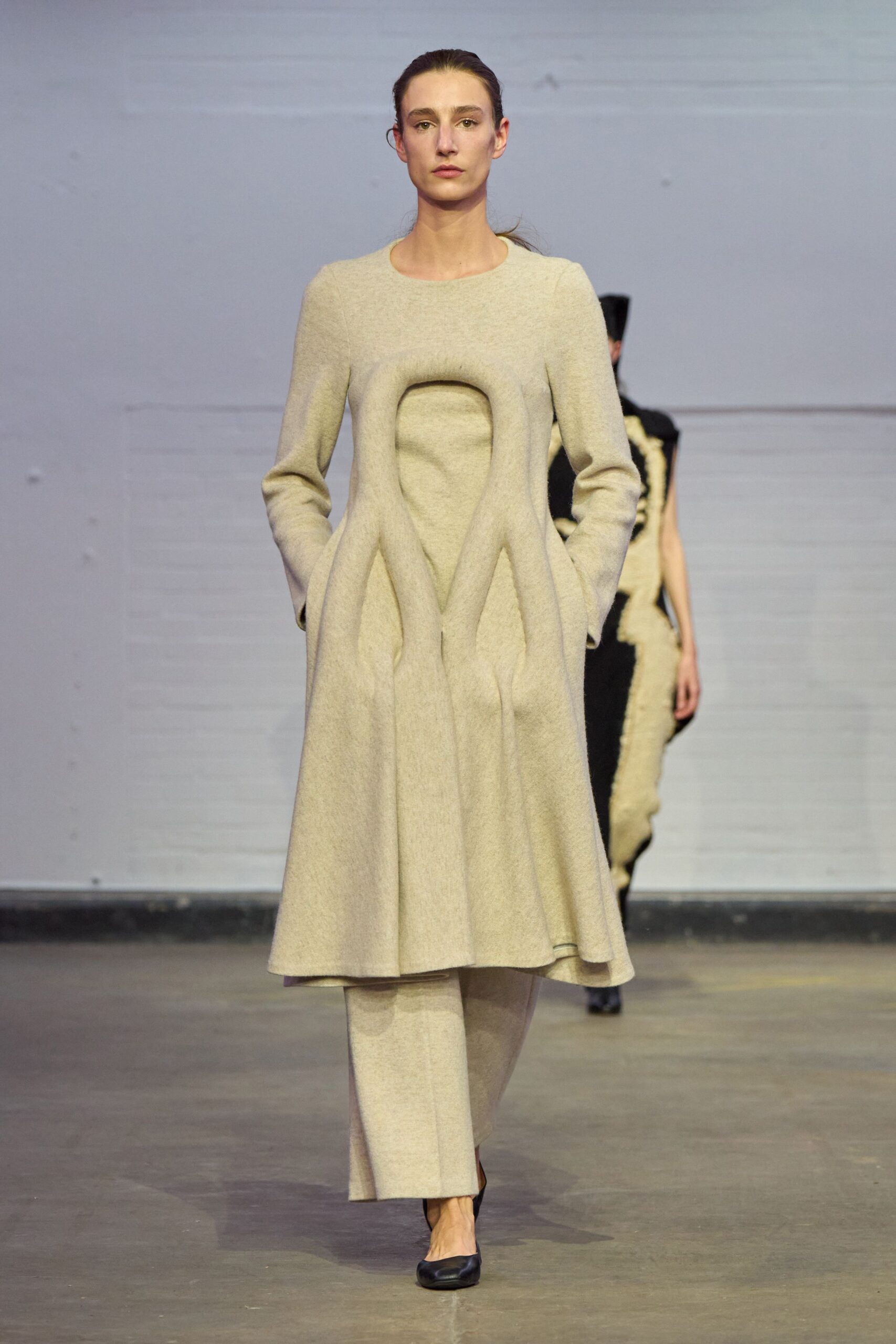 beige wool long-sleeve high-neck fitted draped pockets dress