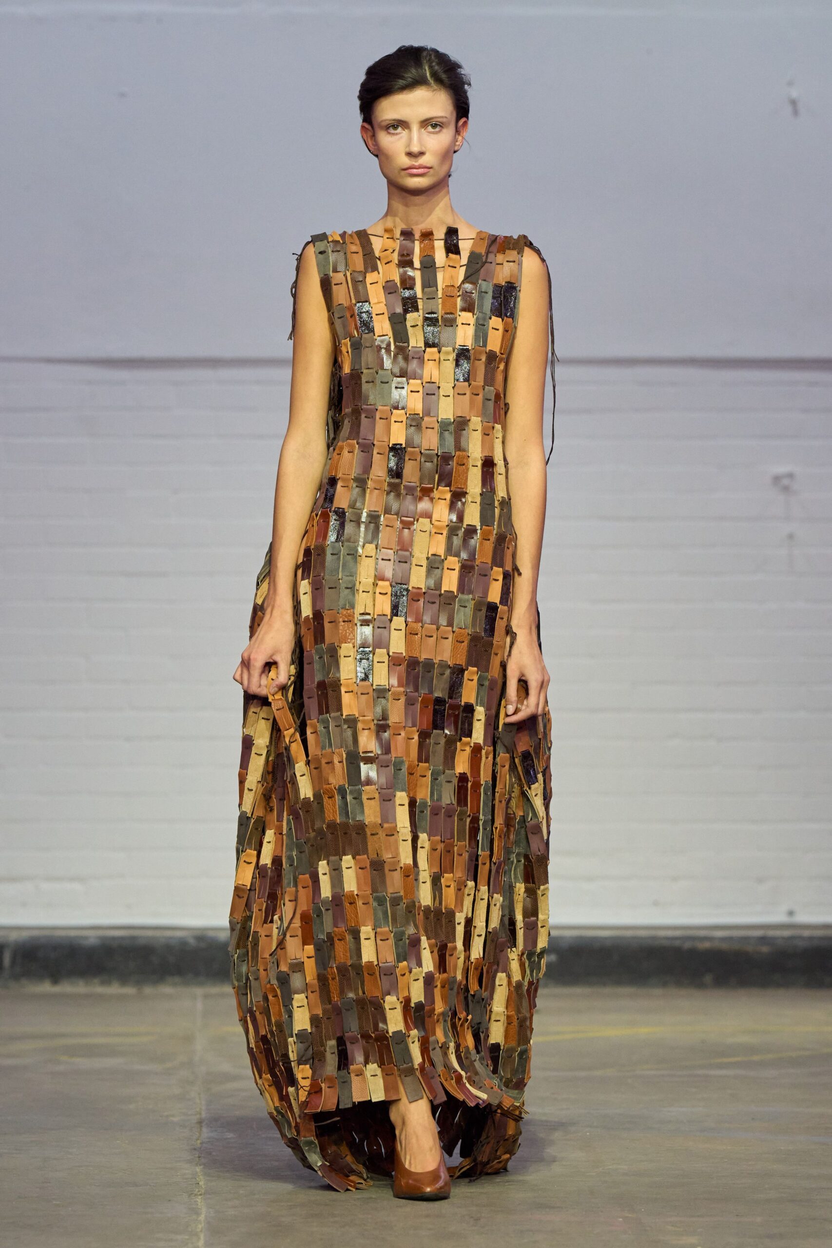 brown silk sleeveless high-neck fitted layered pleated gown