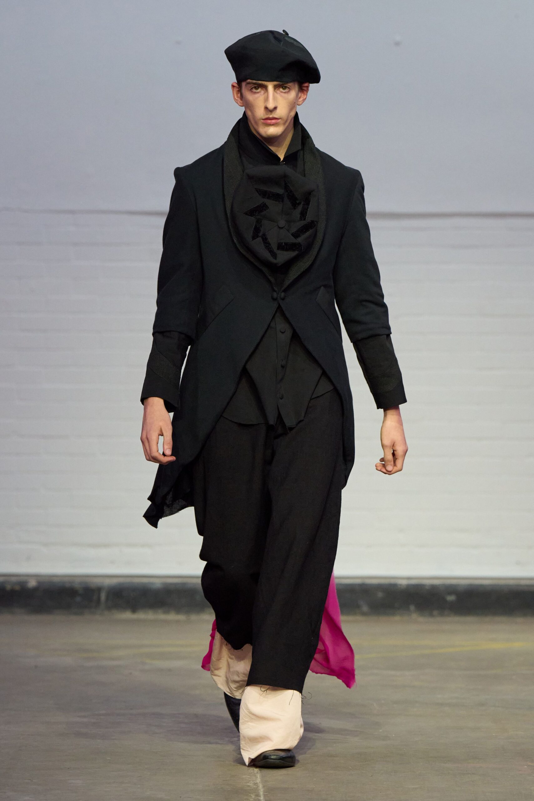 black wool long-sleeve collared structured layered coat