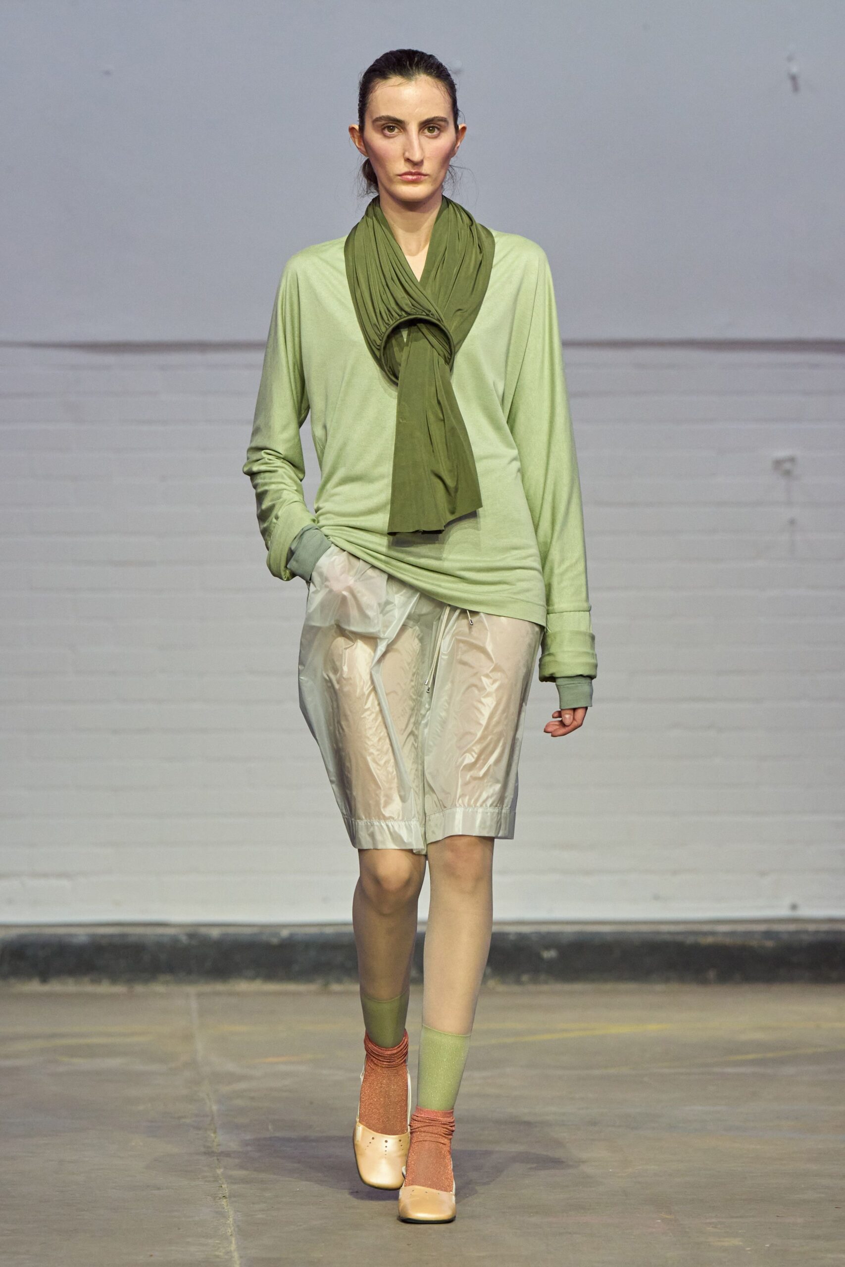 green cotton long-sleeve v-neck relaxed top