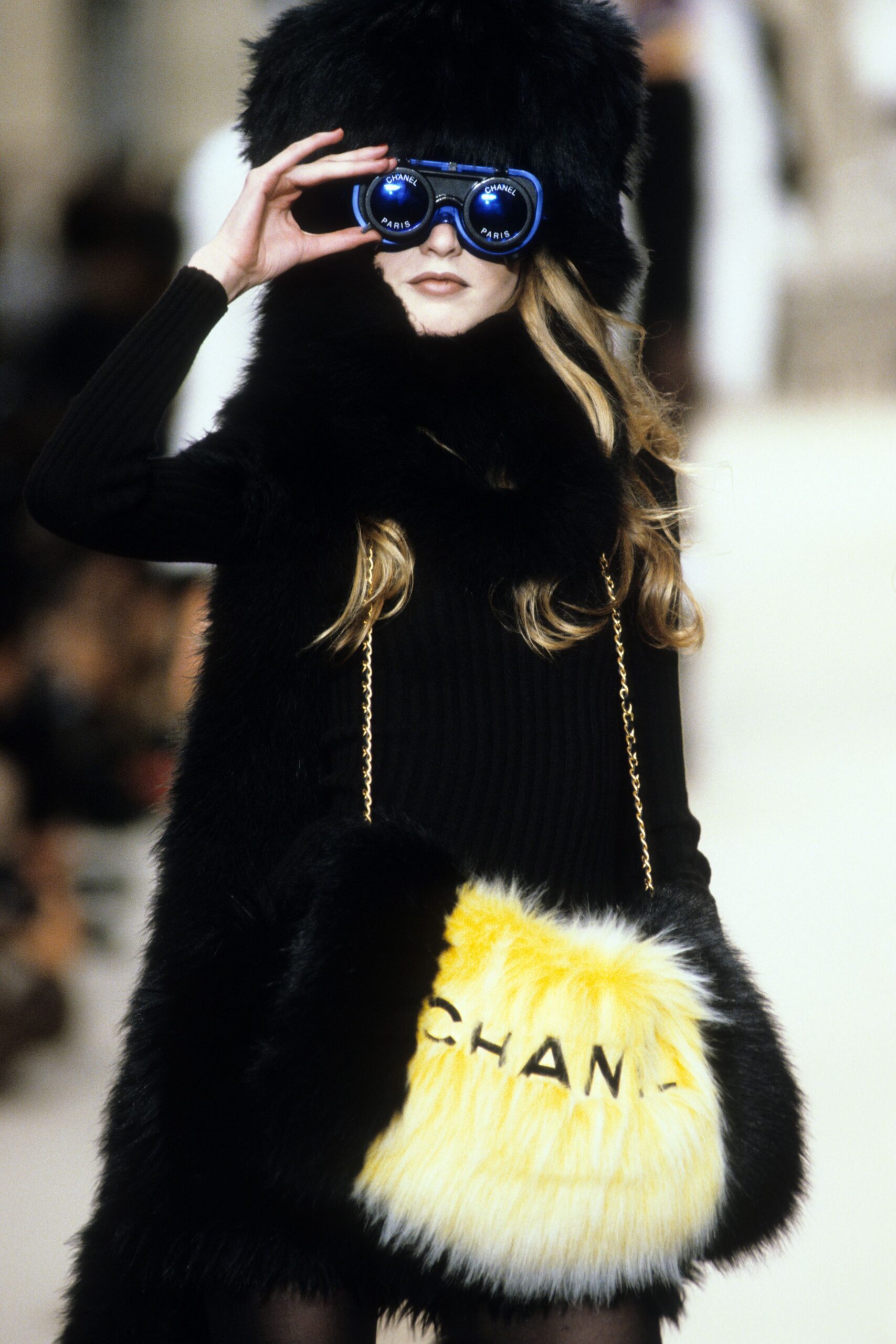 black fur cape with sunglasses