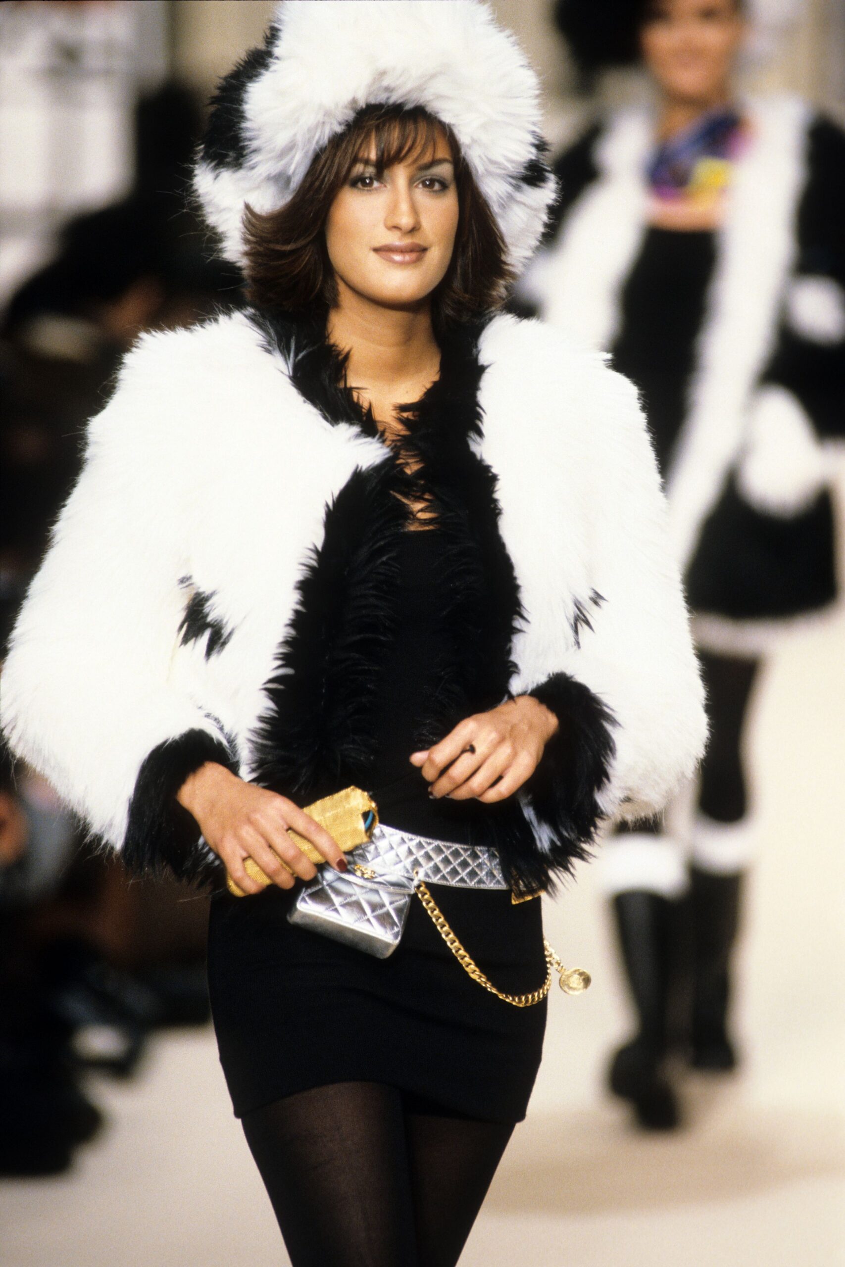 black mini dress with faux-fur coat