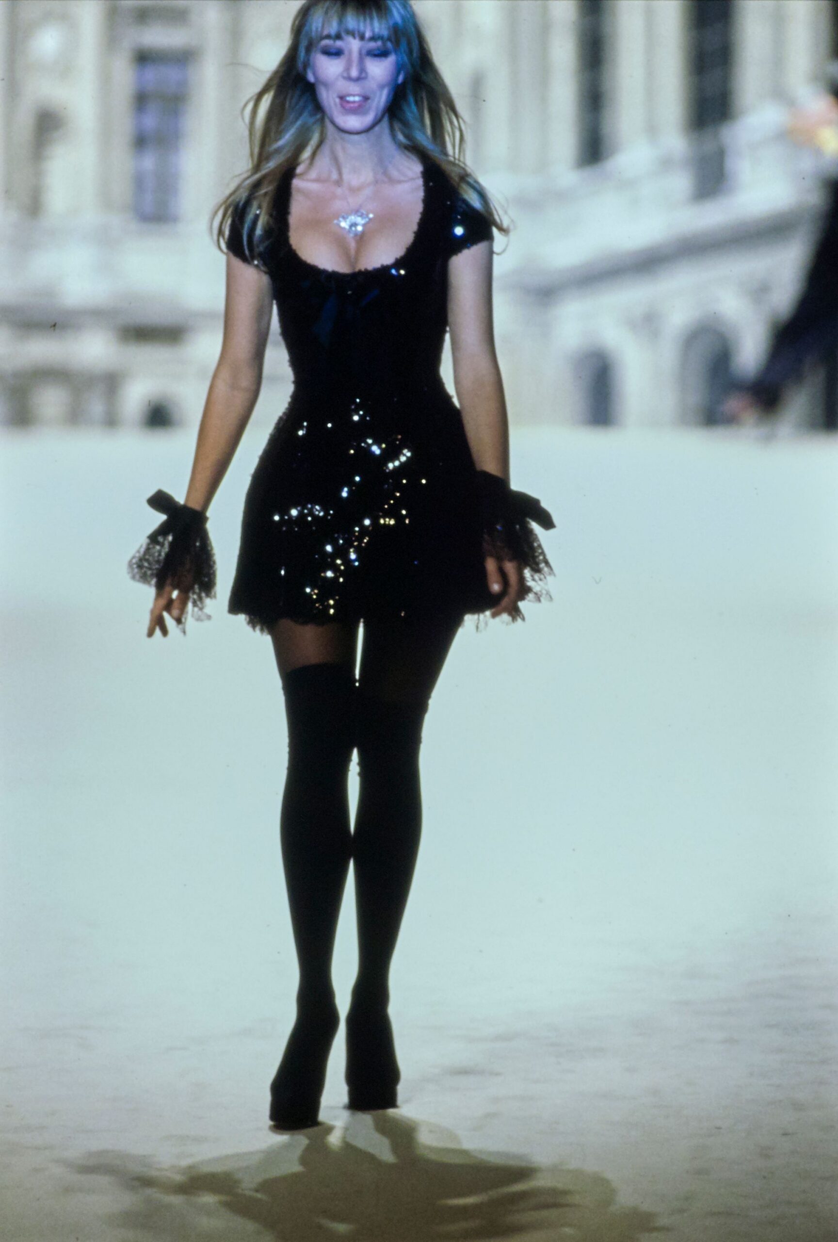 black sequined mini-dress with heels