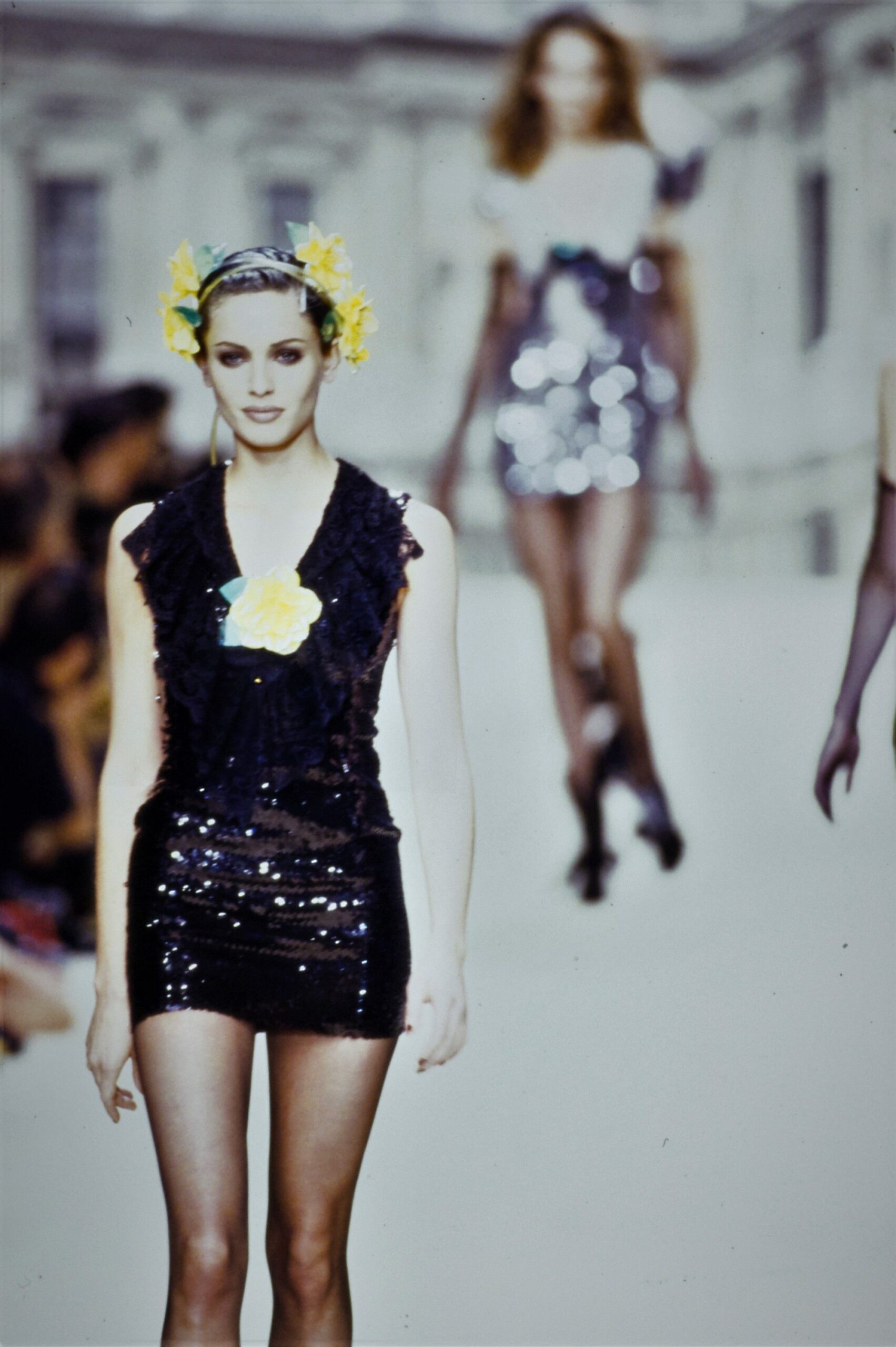 black sequin mini-dress and white silk dress