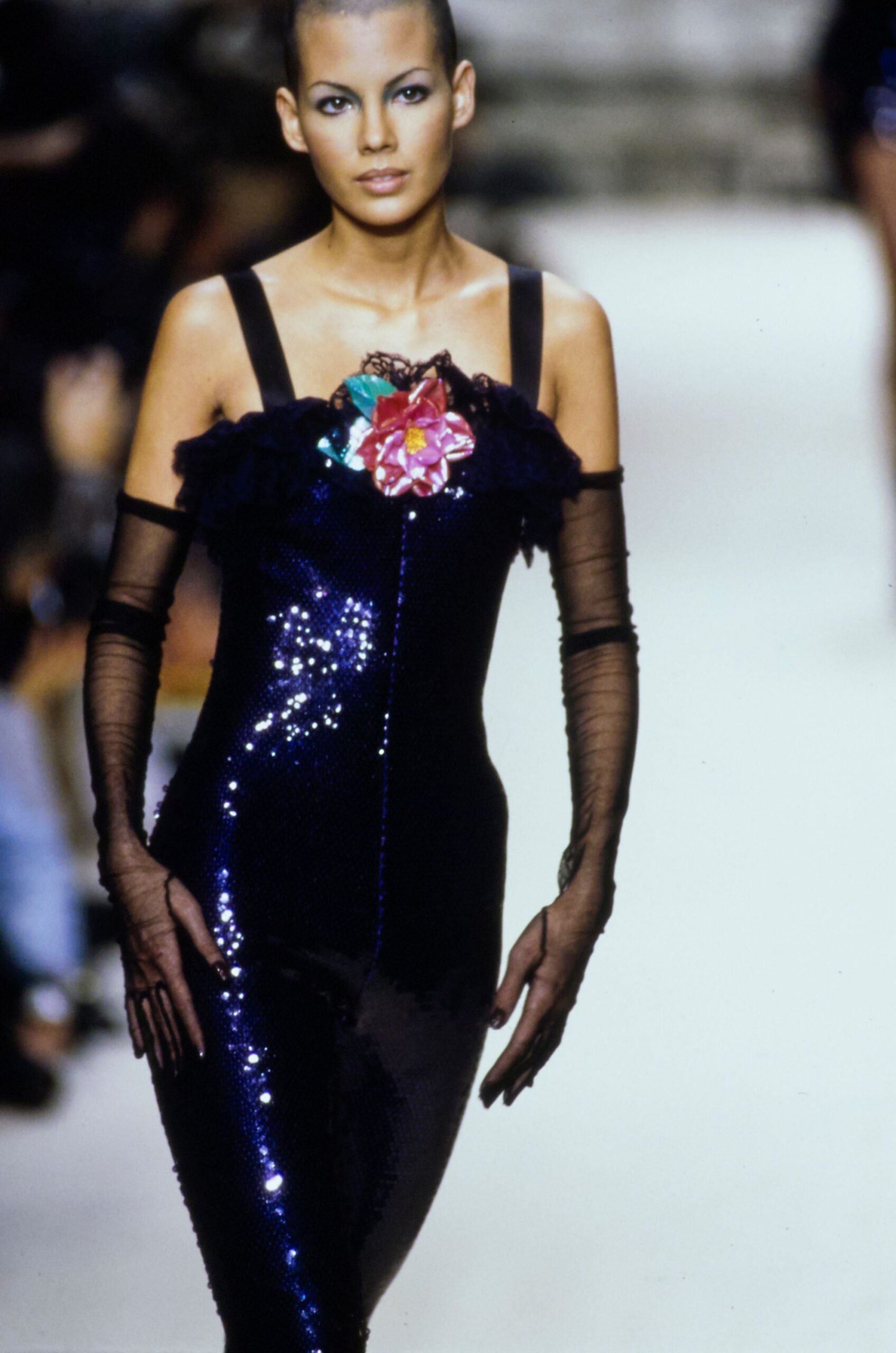 black sequin off-shoulder dress with gloves