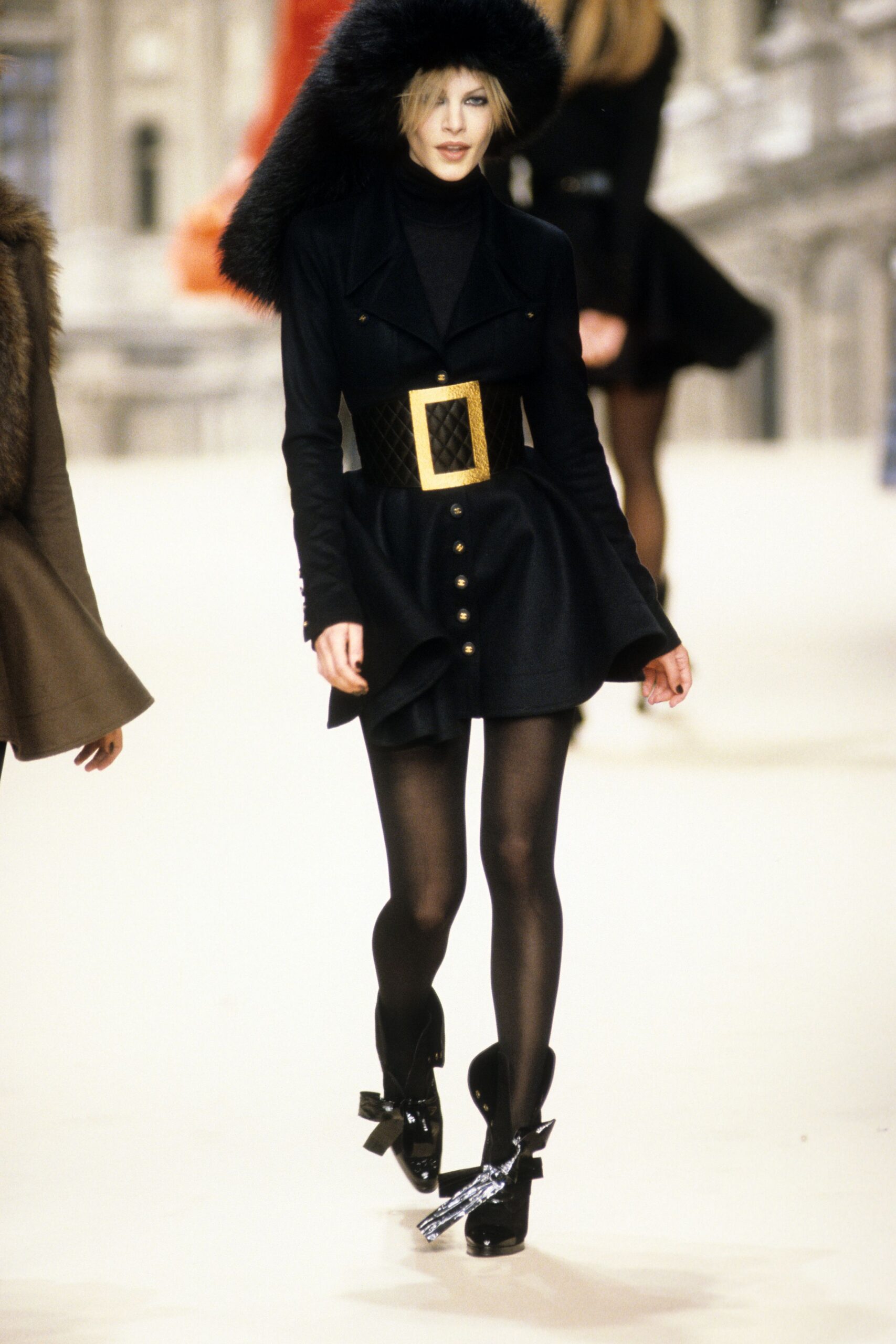 black fitted mini dress with accessories