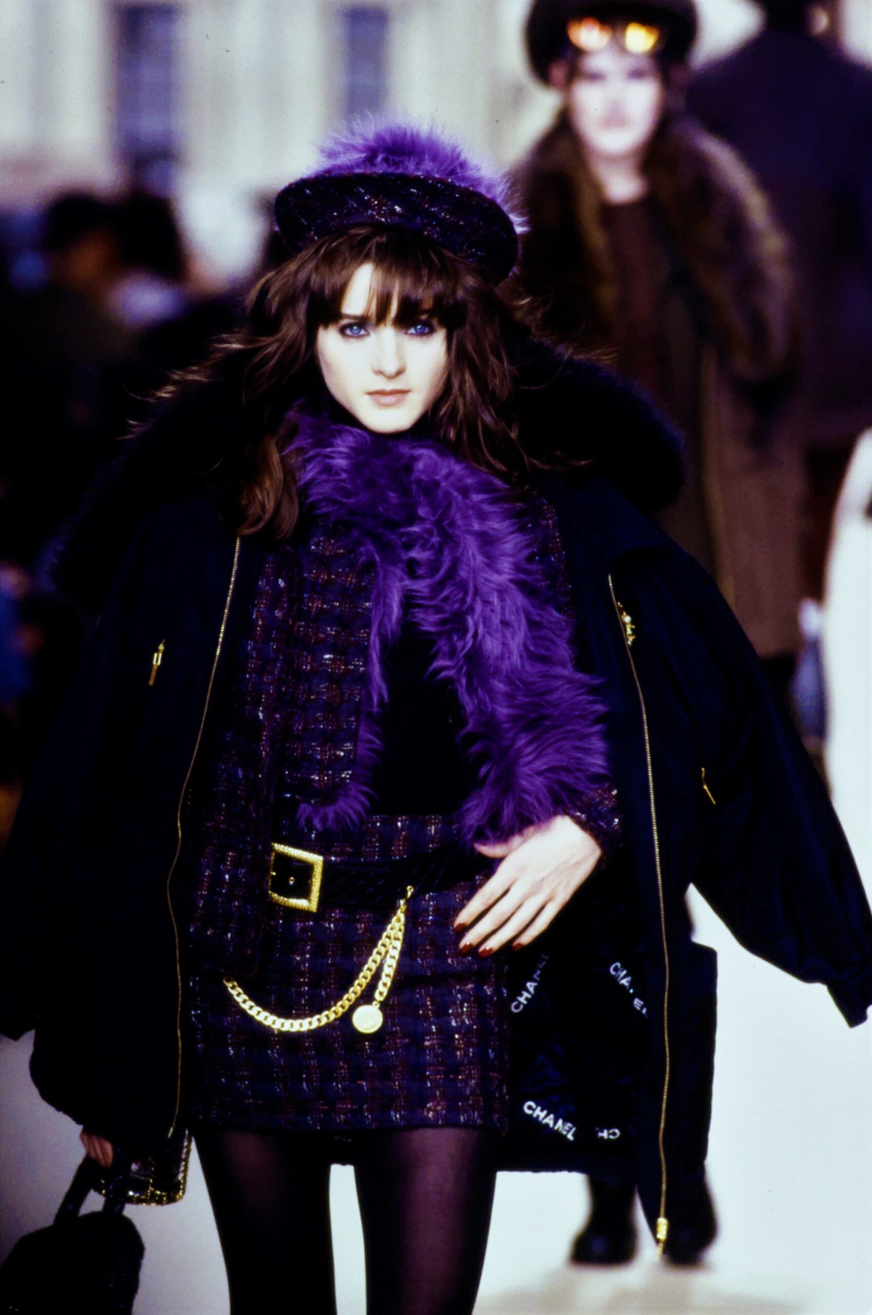 purple pleated mini skirt with oversized coat