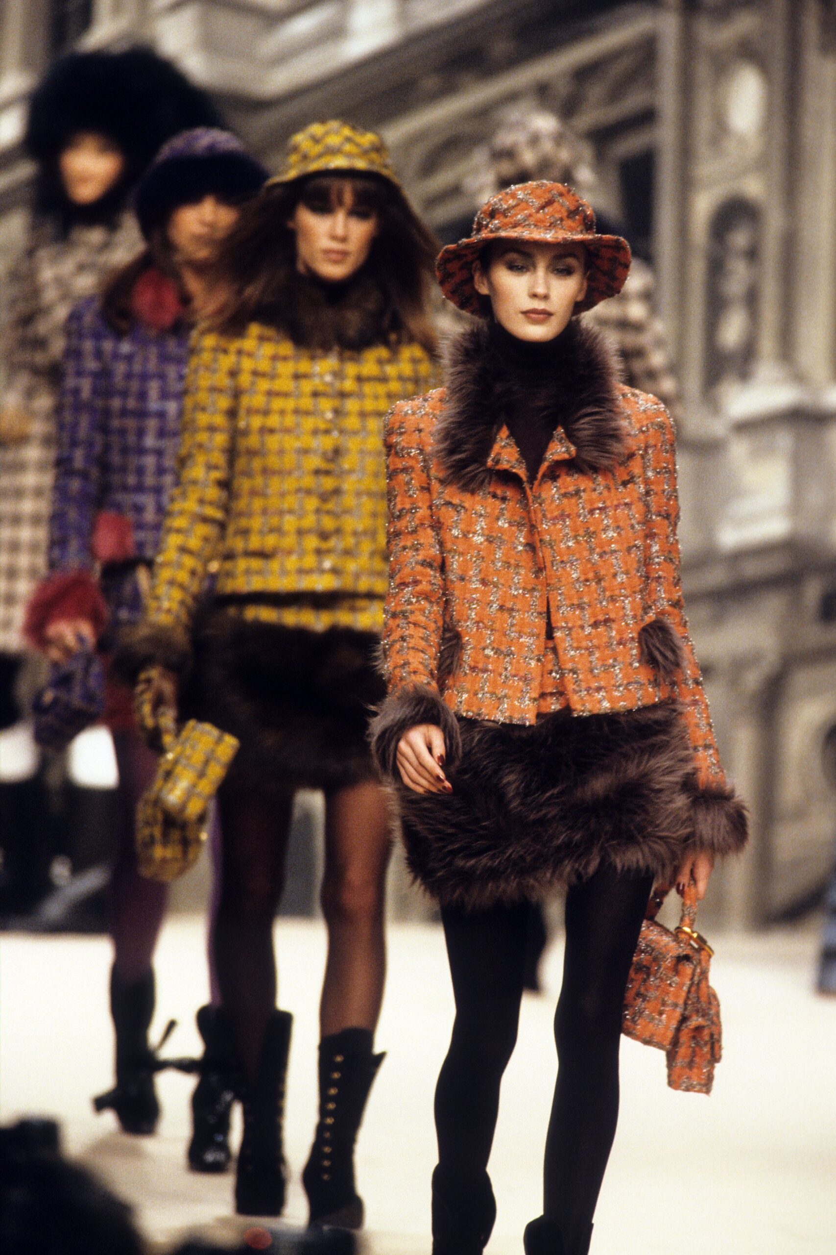 orange tweed jacket with black skirt