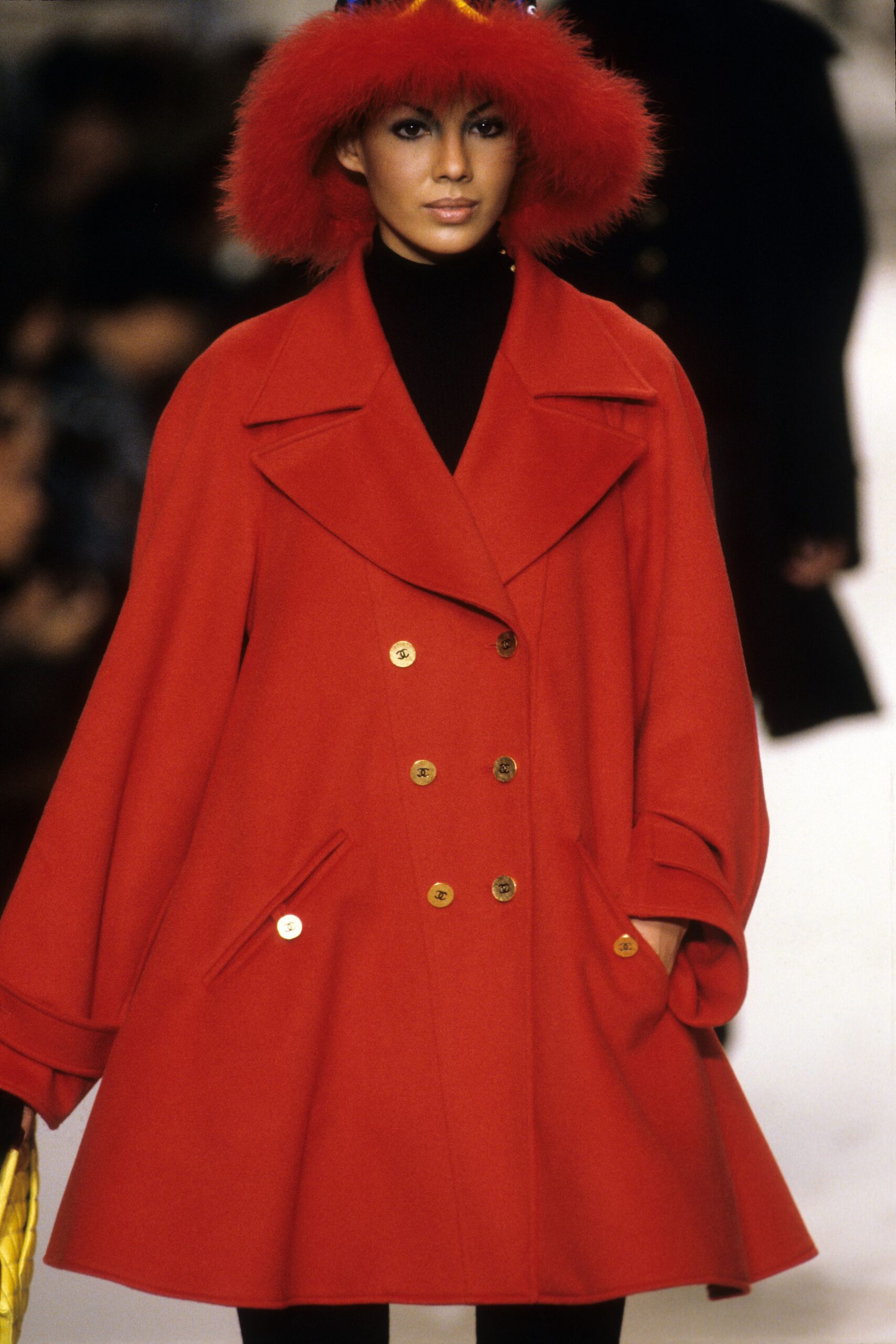 red wool coat with fluffy hat