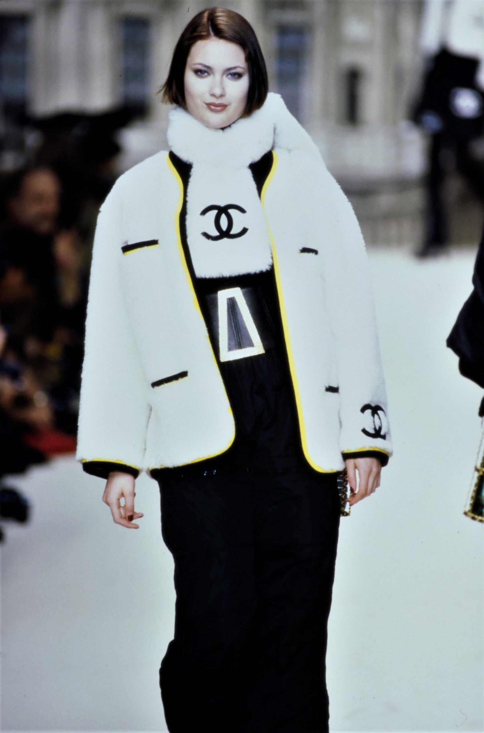 white wool fitted jacket with black top