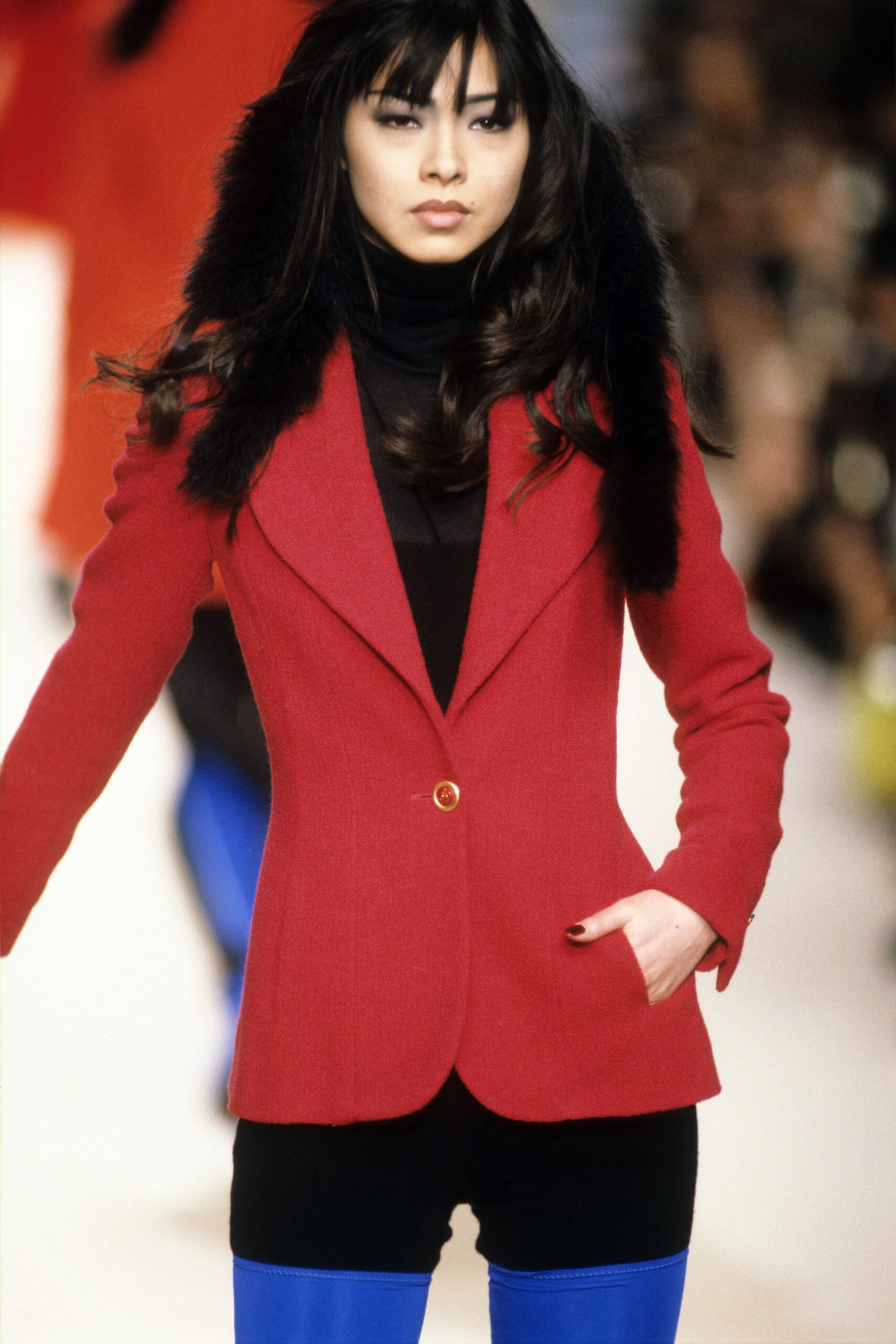 red tailored blazer with black top