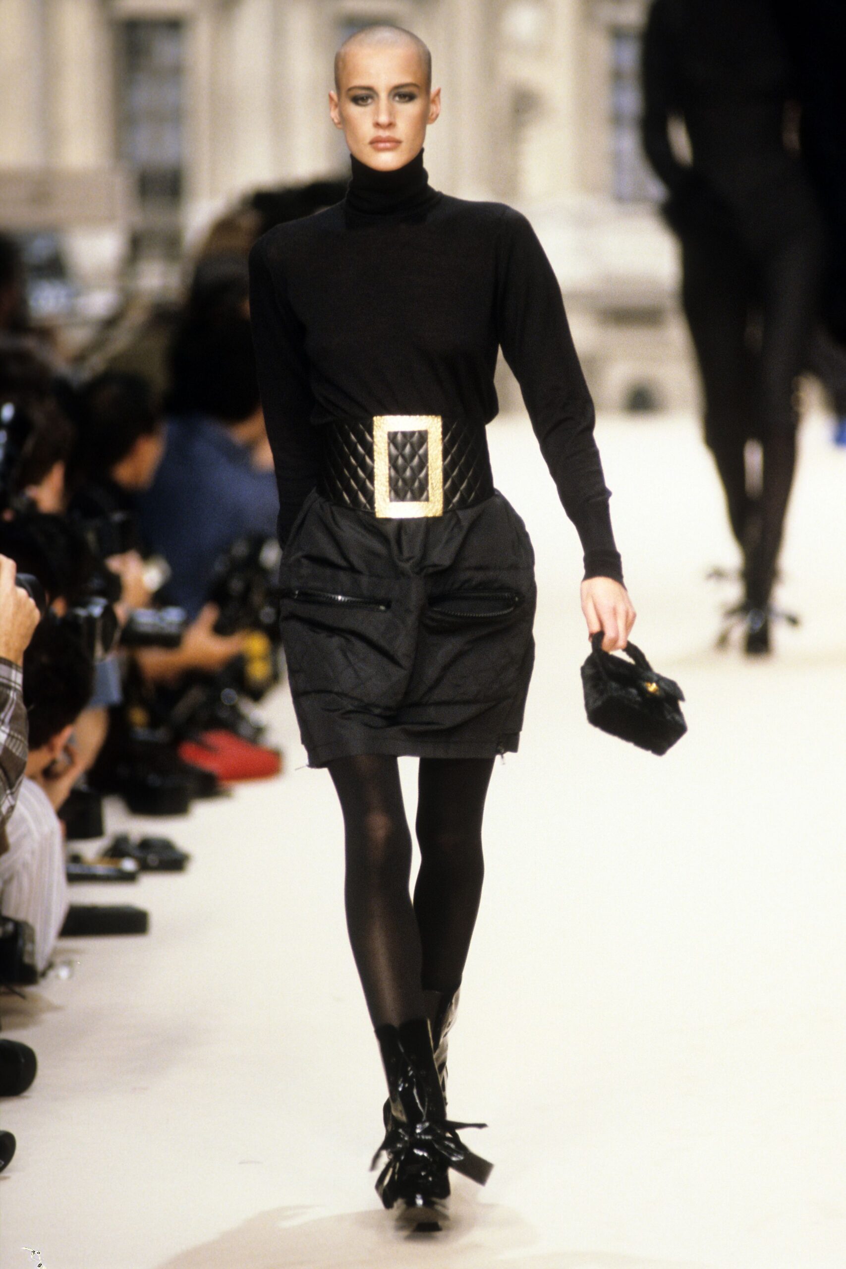 black fitted top and skirt ensemble