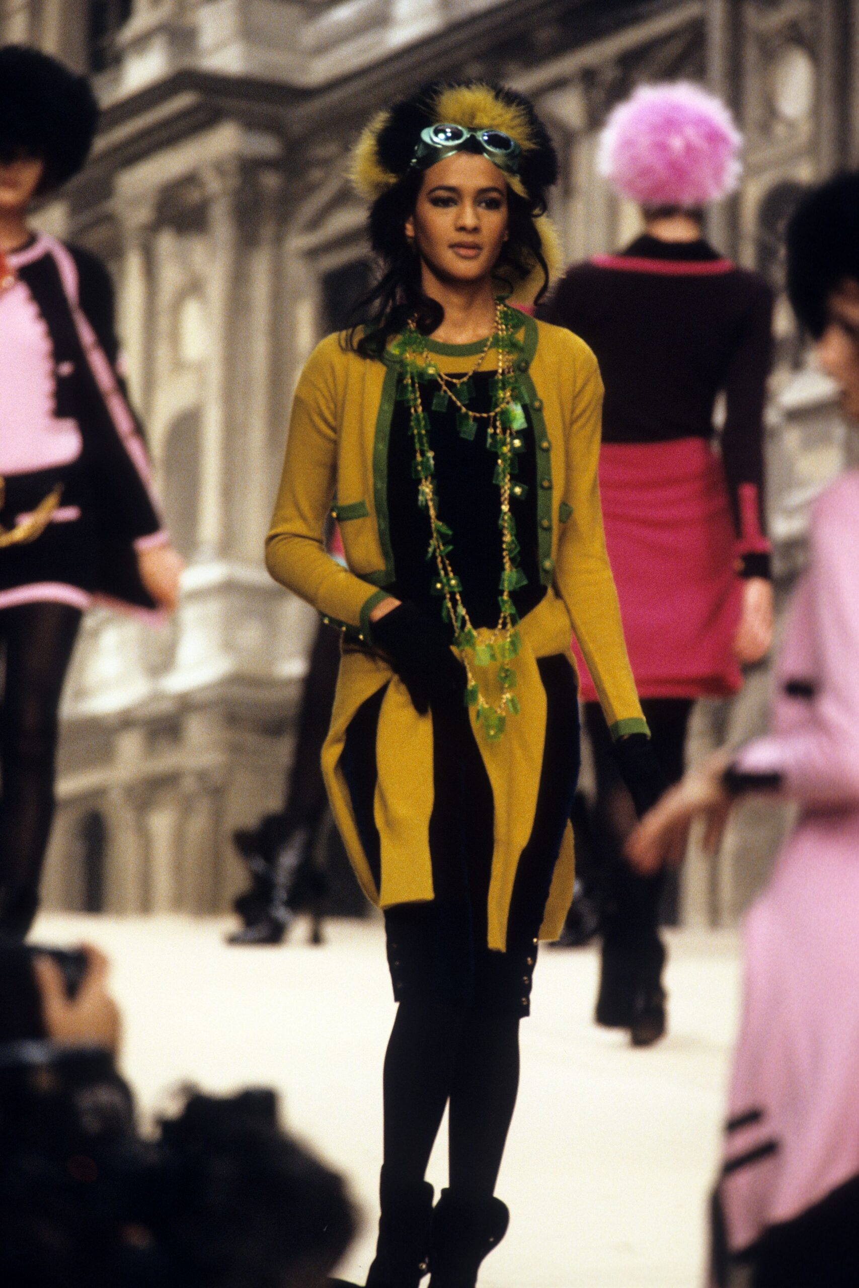 yellow cardigan black top fitted pants