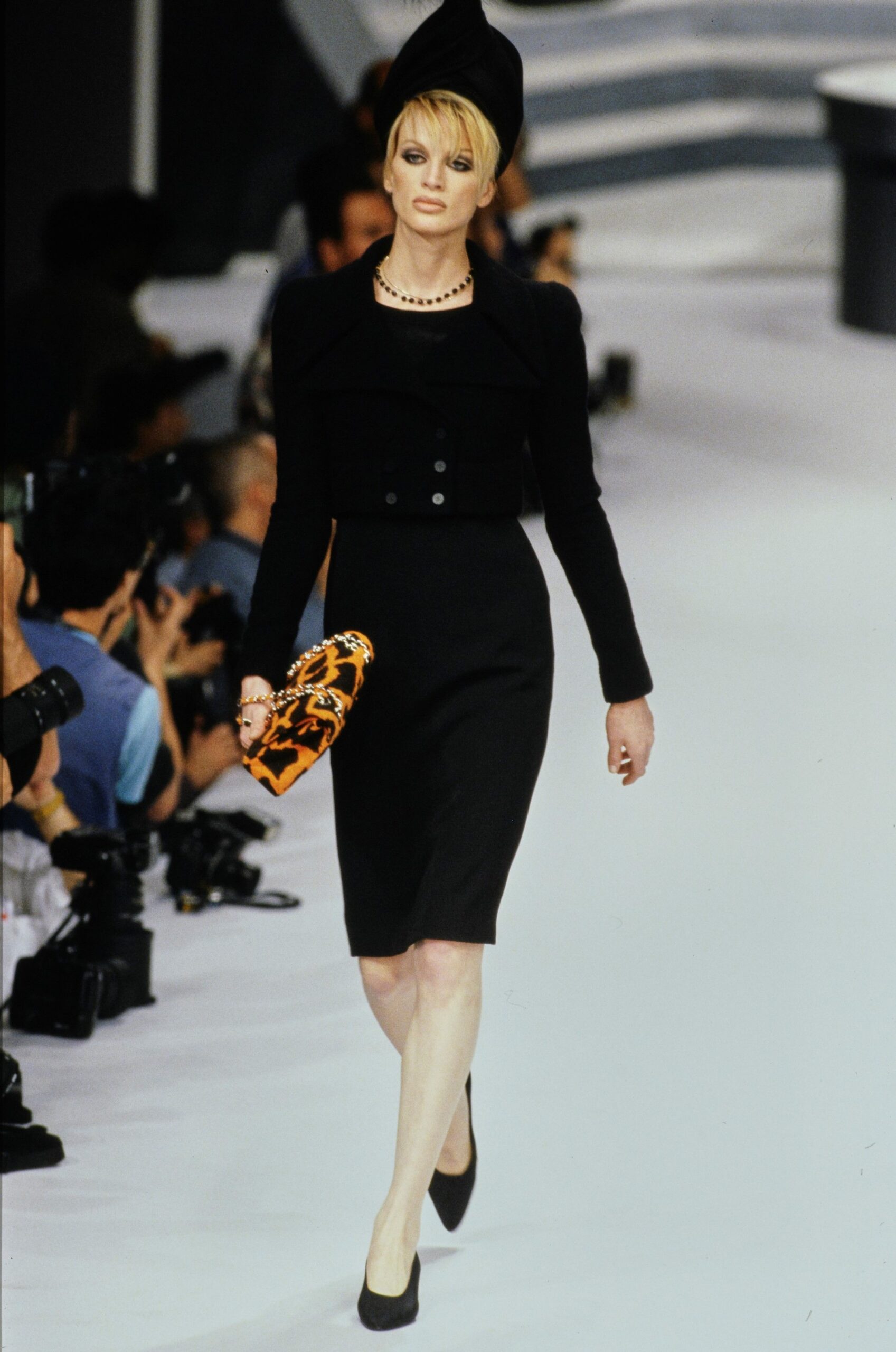 black fitted midi dress with accessories