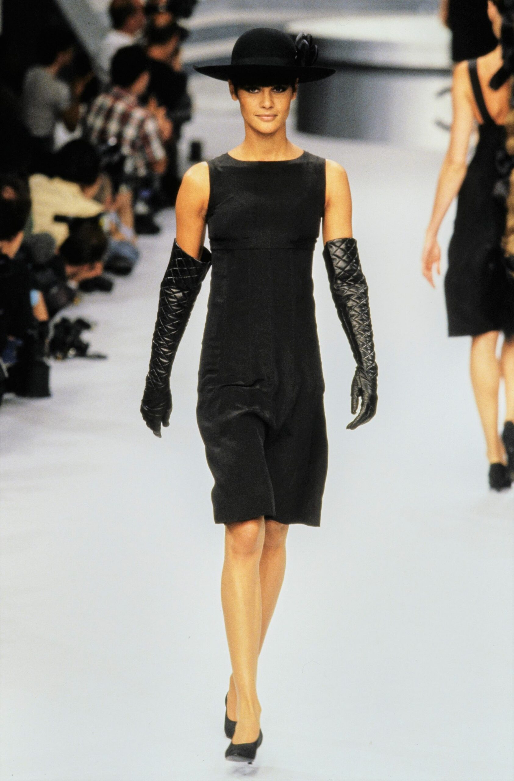 black fitted mini dress with hat
