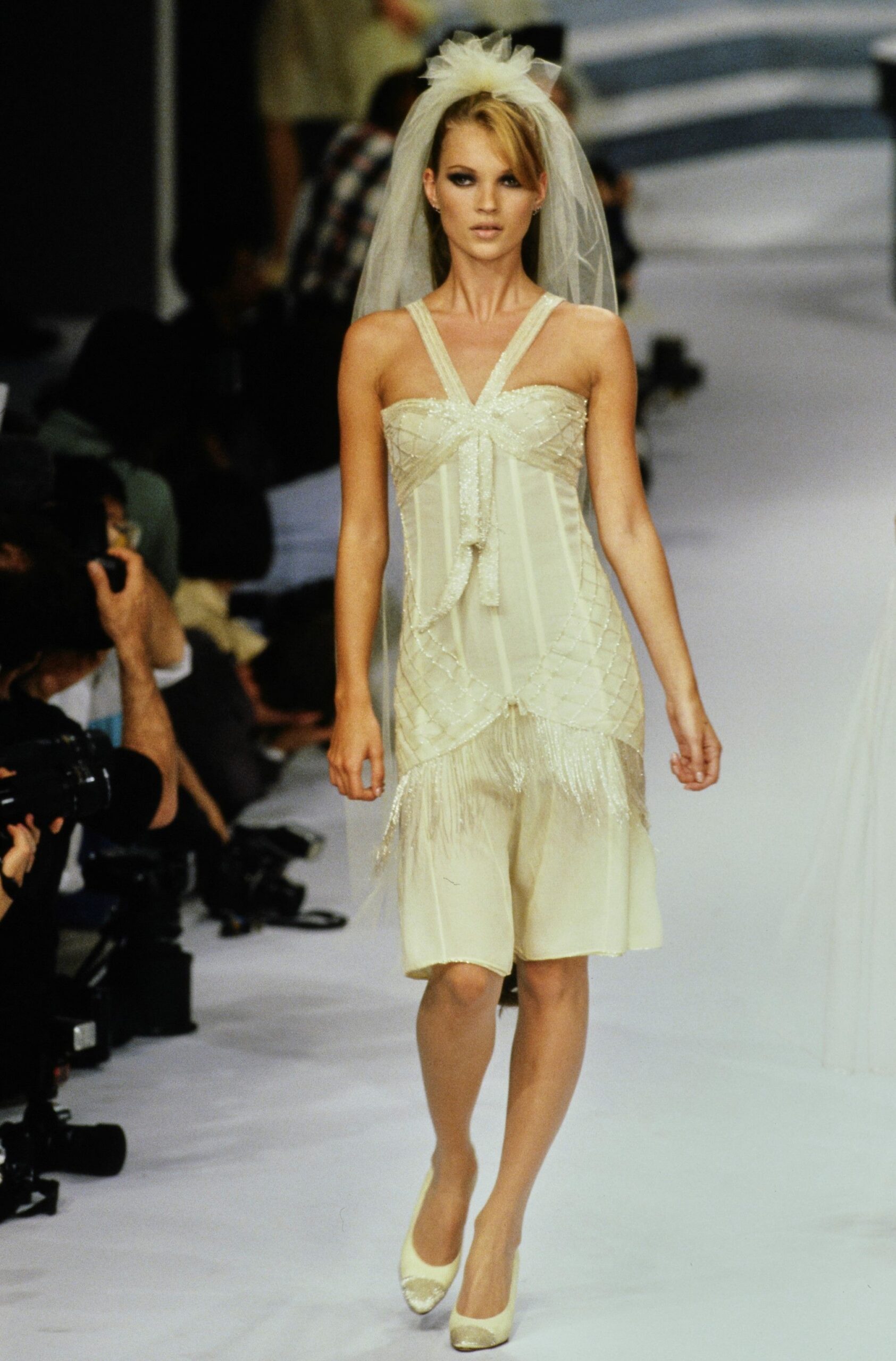 white silk fitted dress with veil