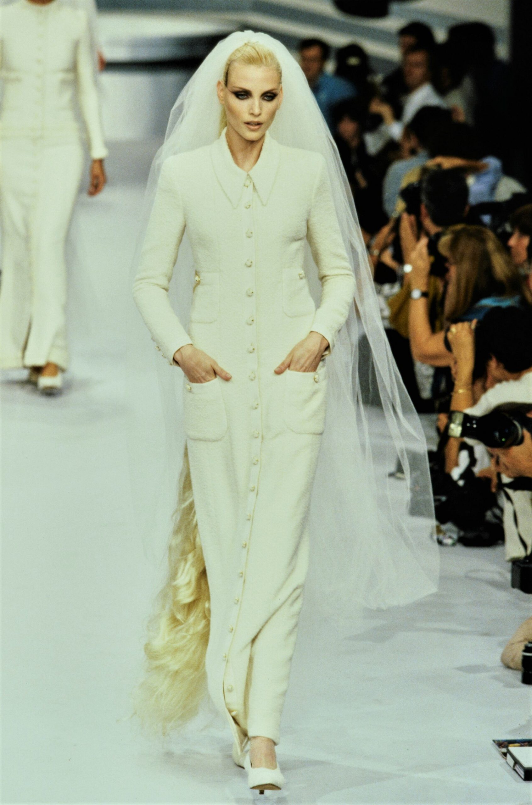 white fitted gown with veil