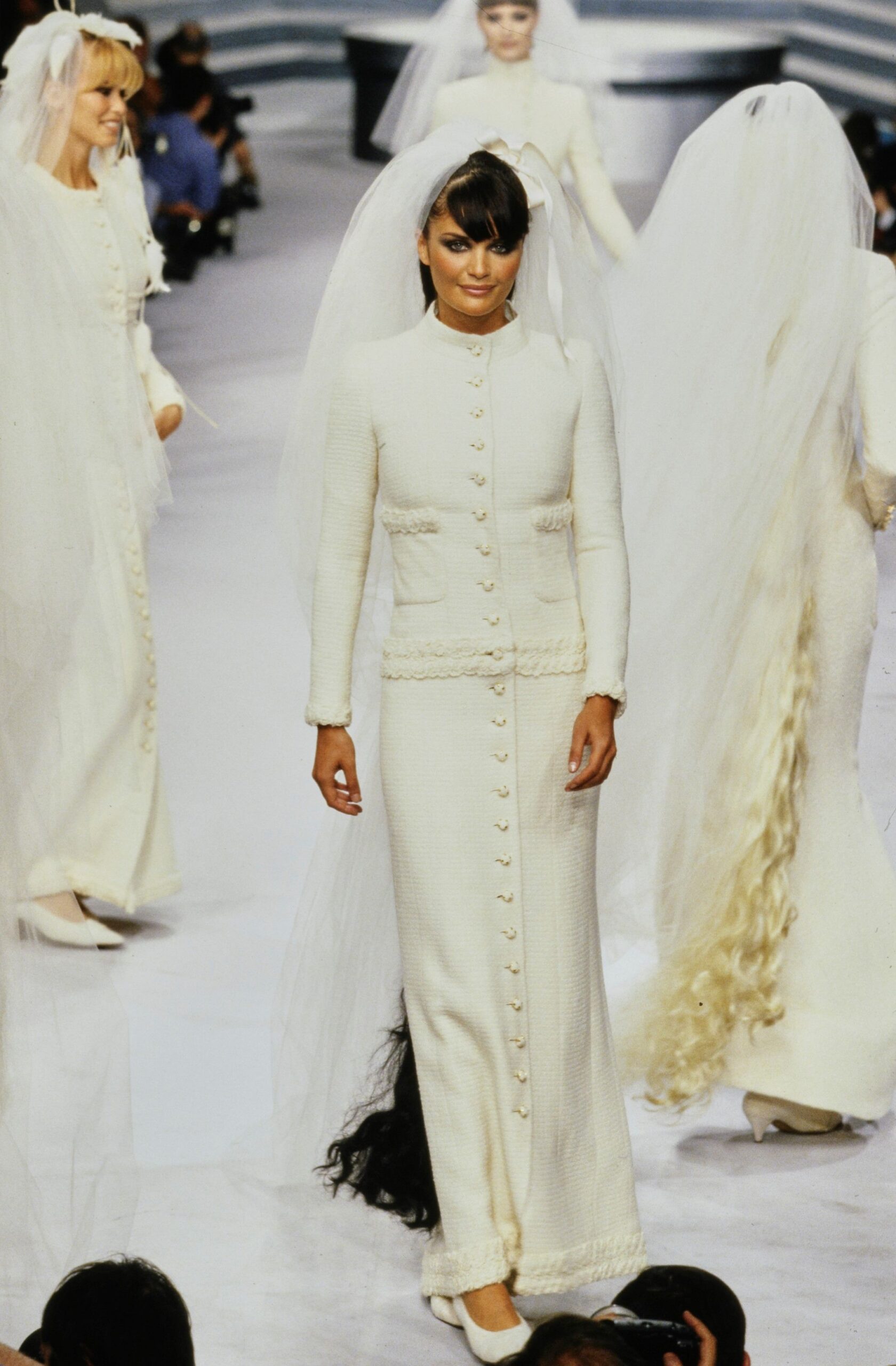 white fitted gown with veil