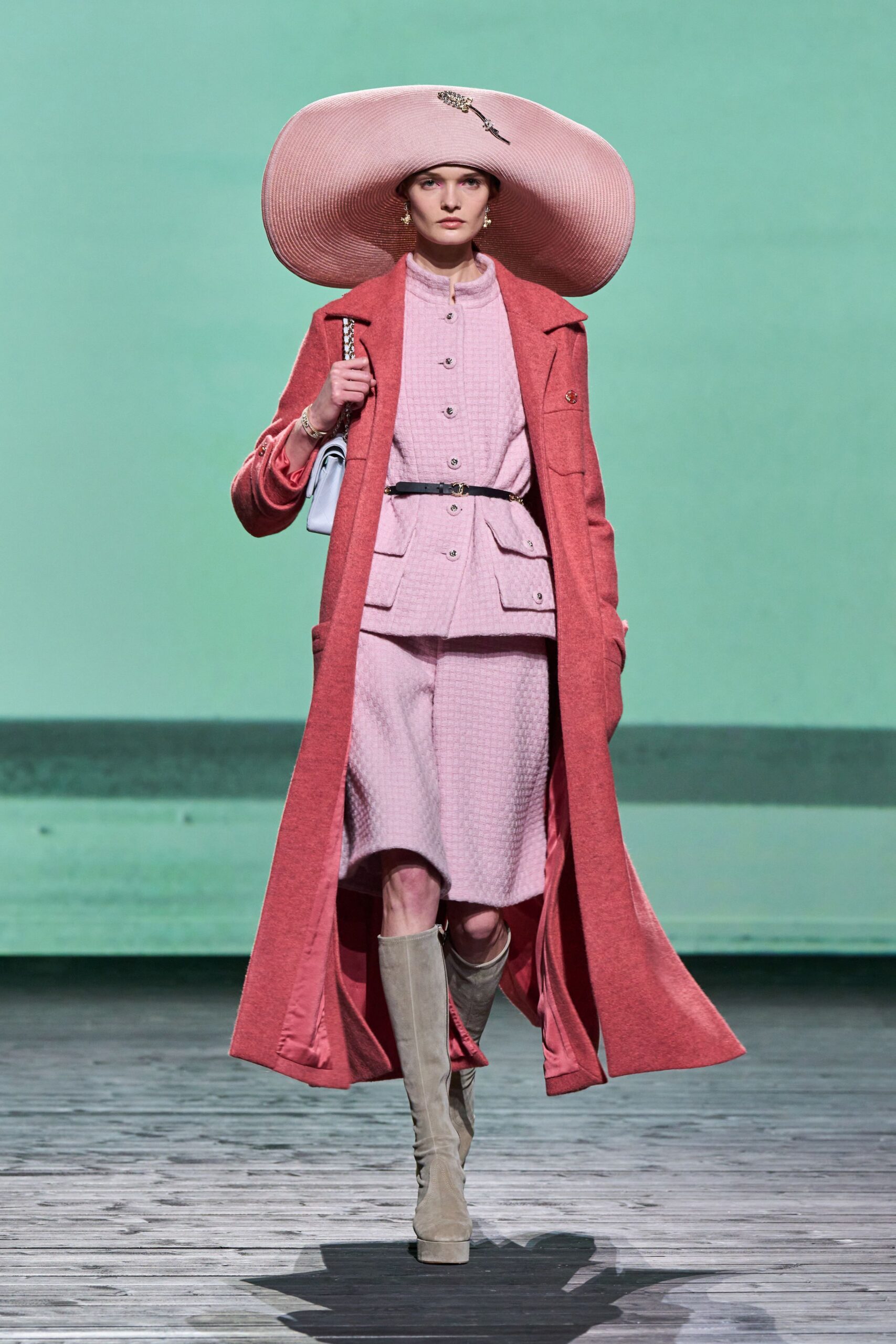 red wool coat with pink blouse