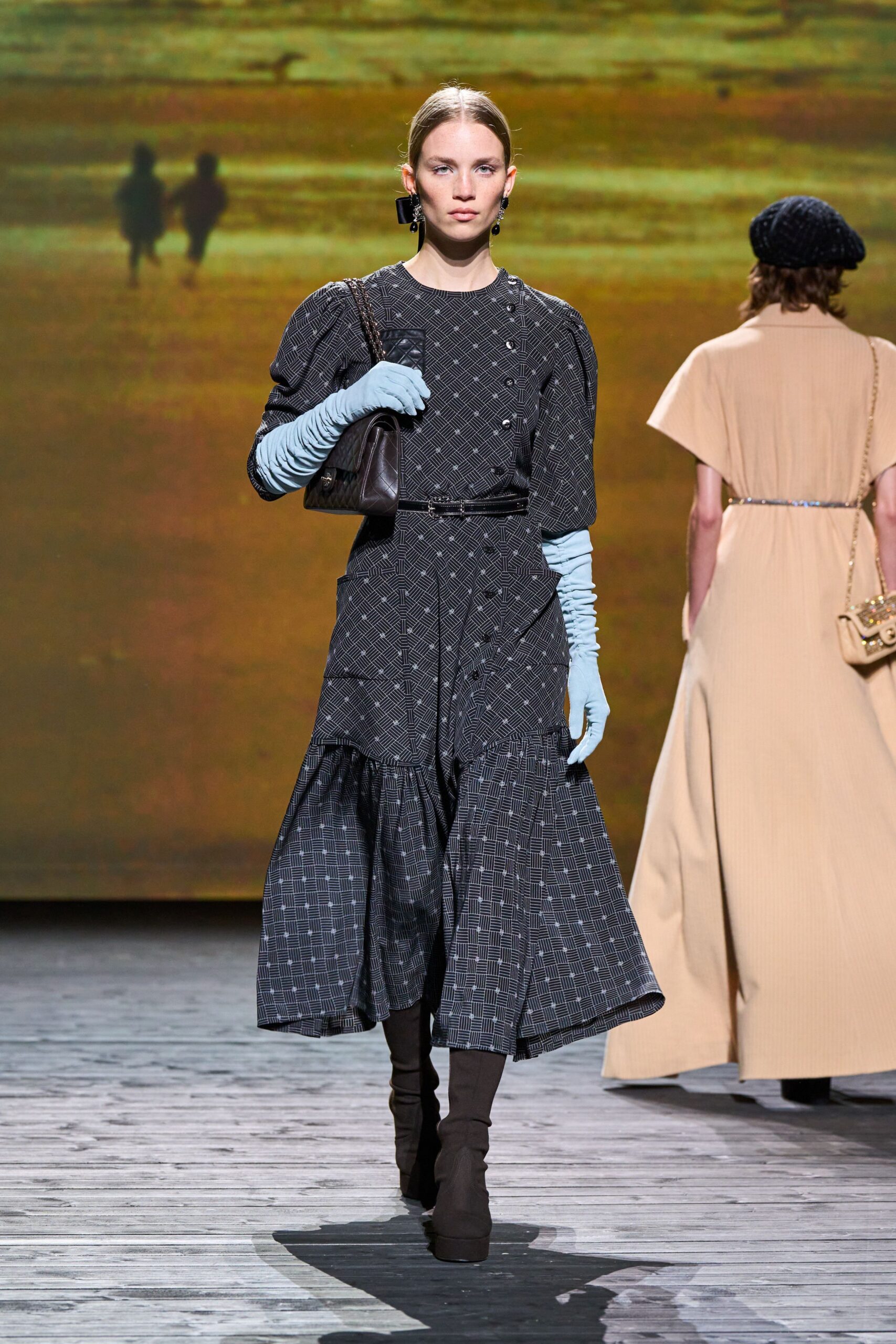 black midi dress with blue gloves