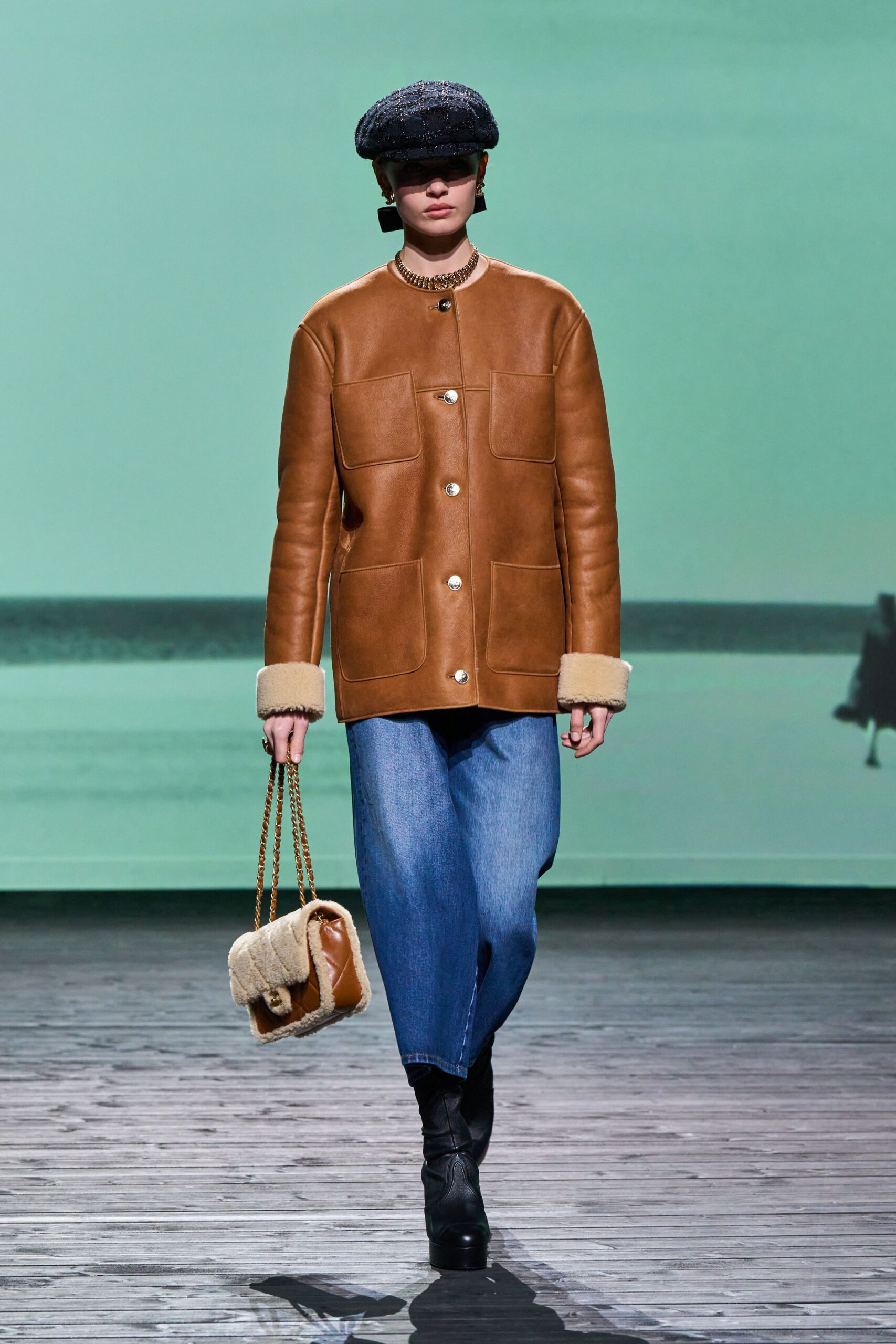 brown leather jacket with denim pants