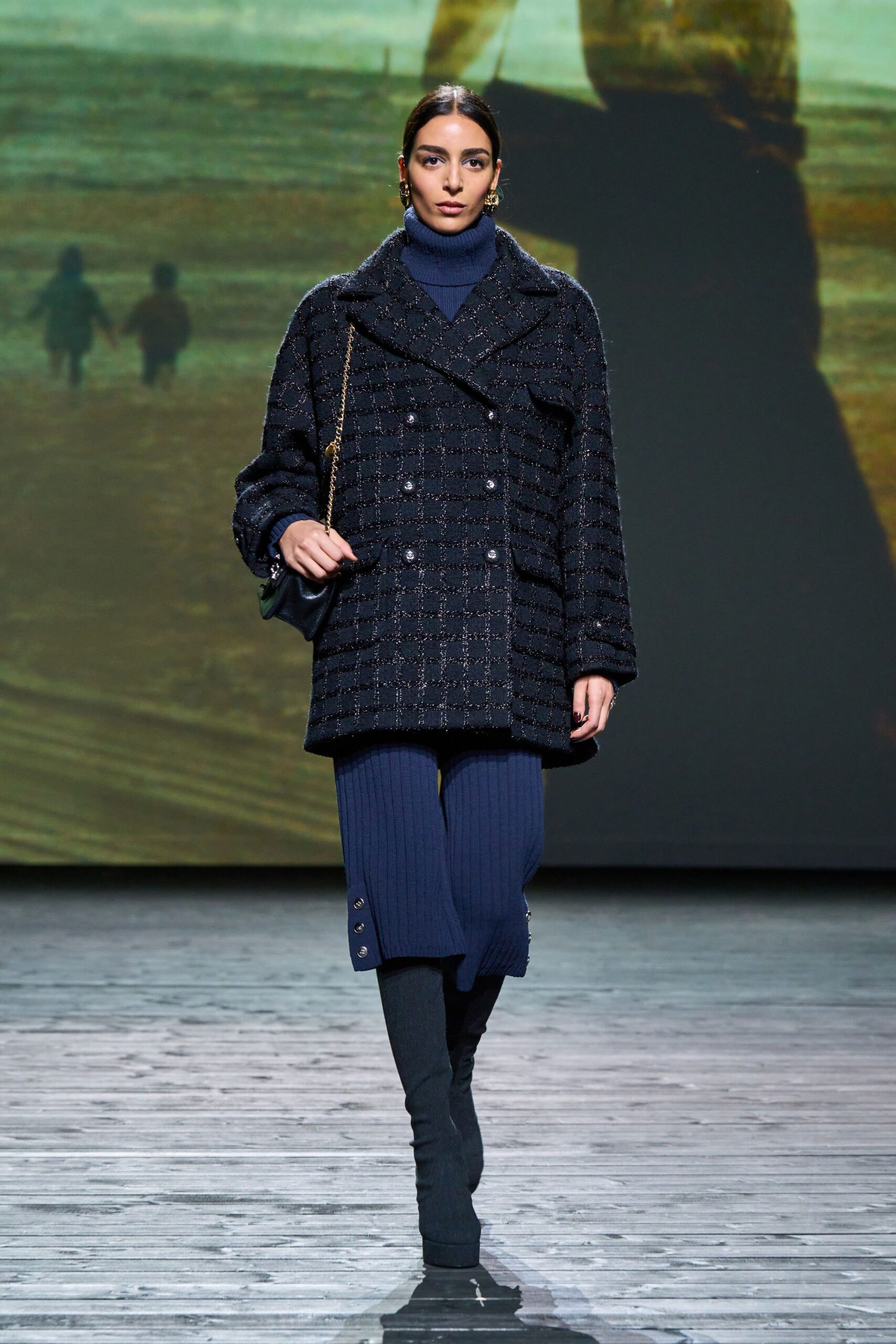 black wool coat with blue top