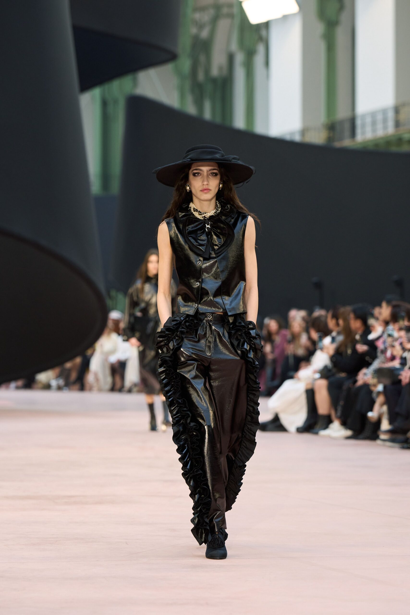black leather sleeveless fitted ruffled top