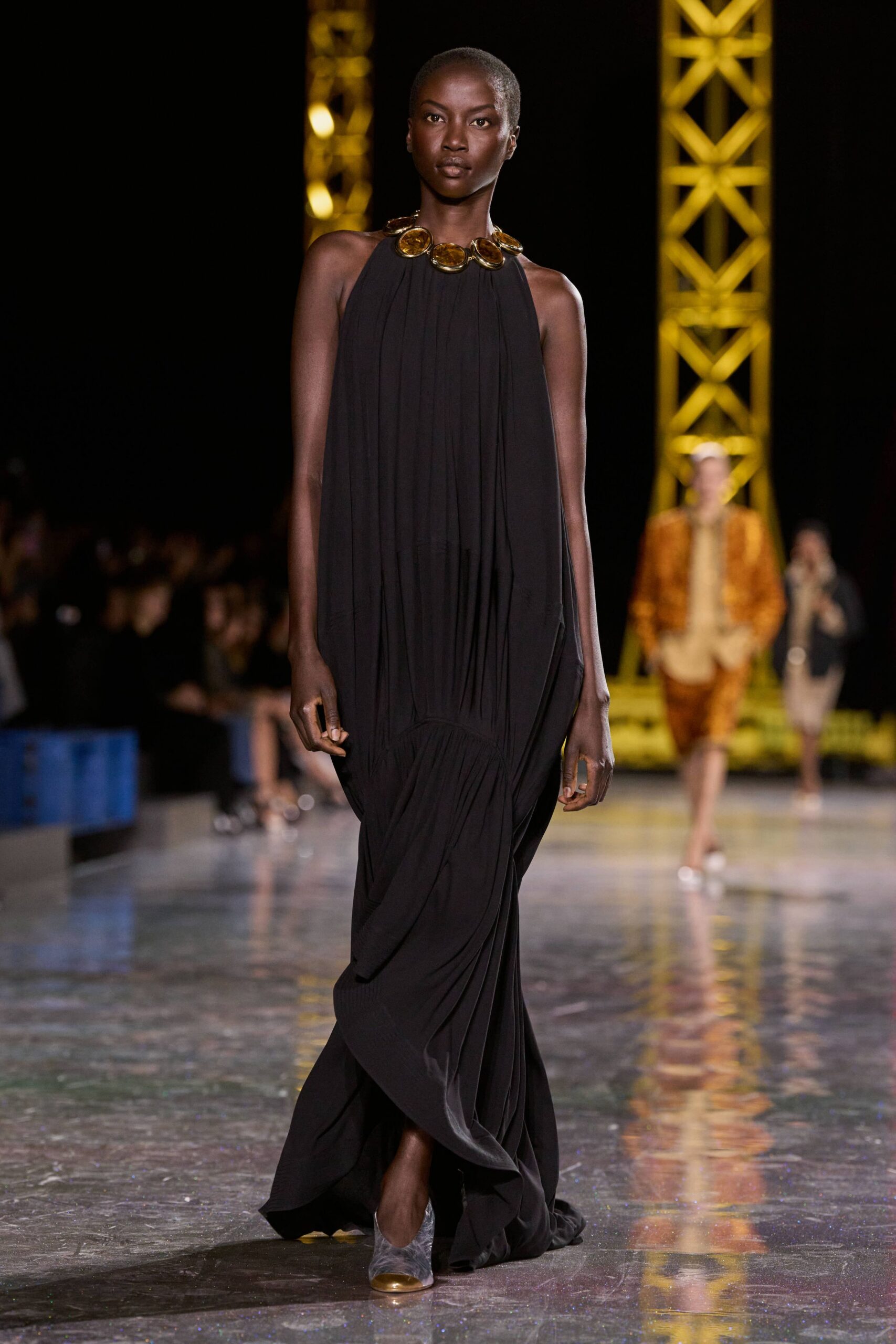 black silk sleeveless high-neck relaxed draped flowing gown