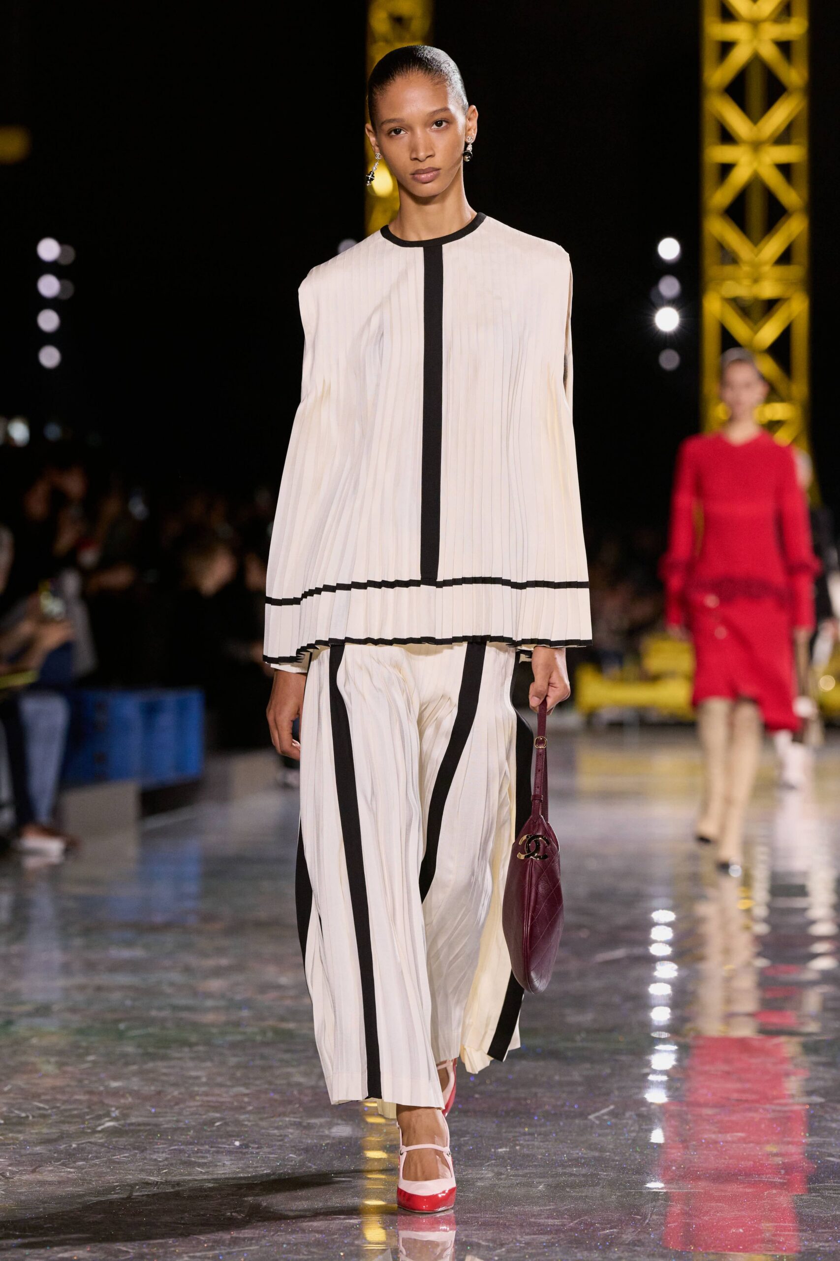 white pleated top and pants