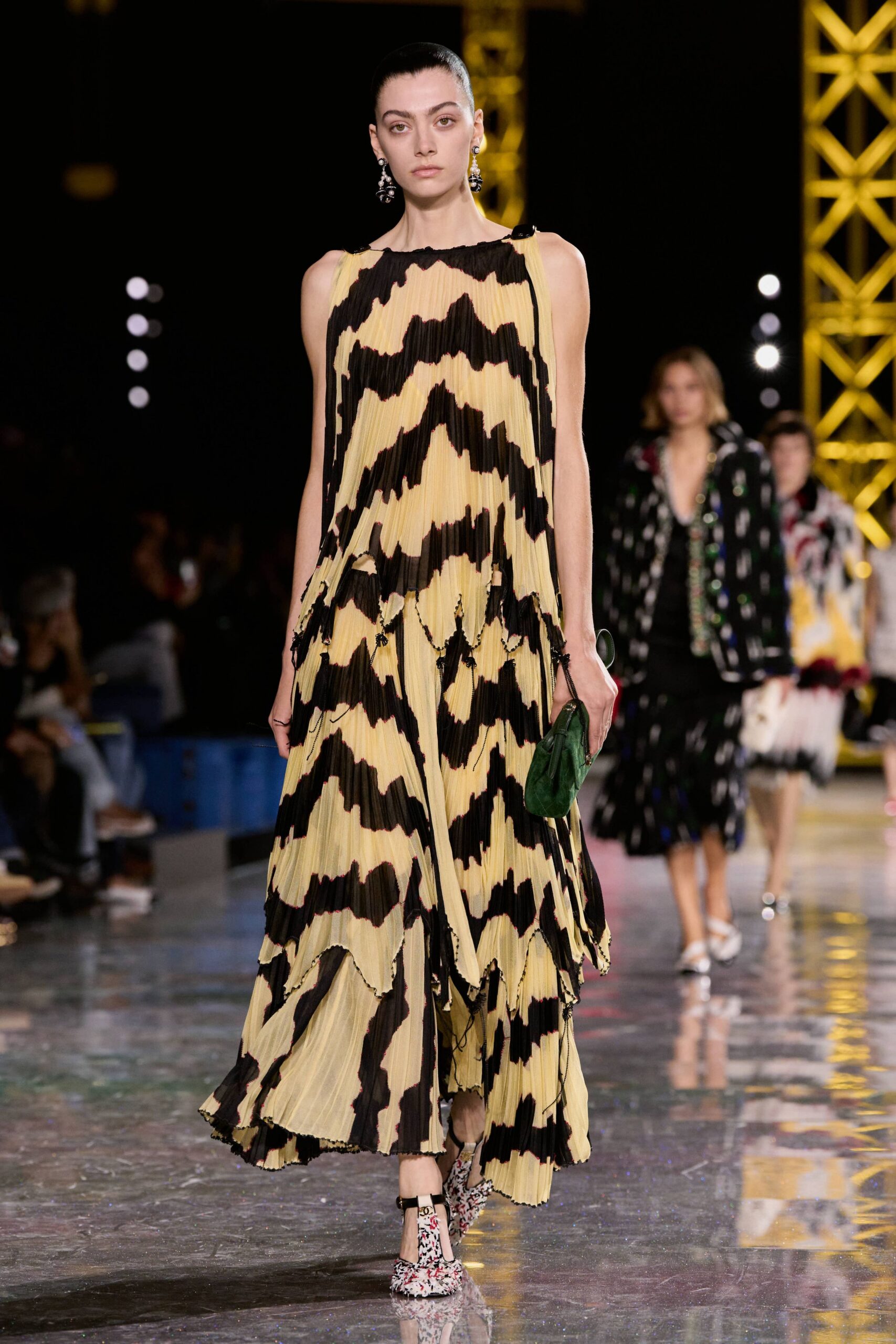 yellow silk sleeveless high-neck fitted pleated flared dress