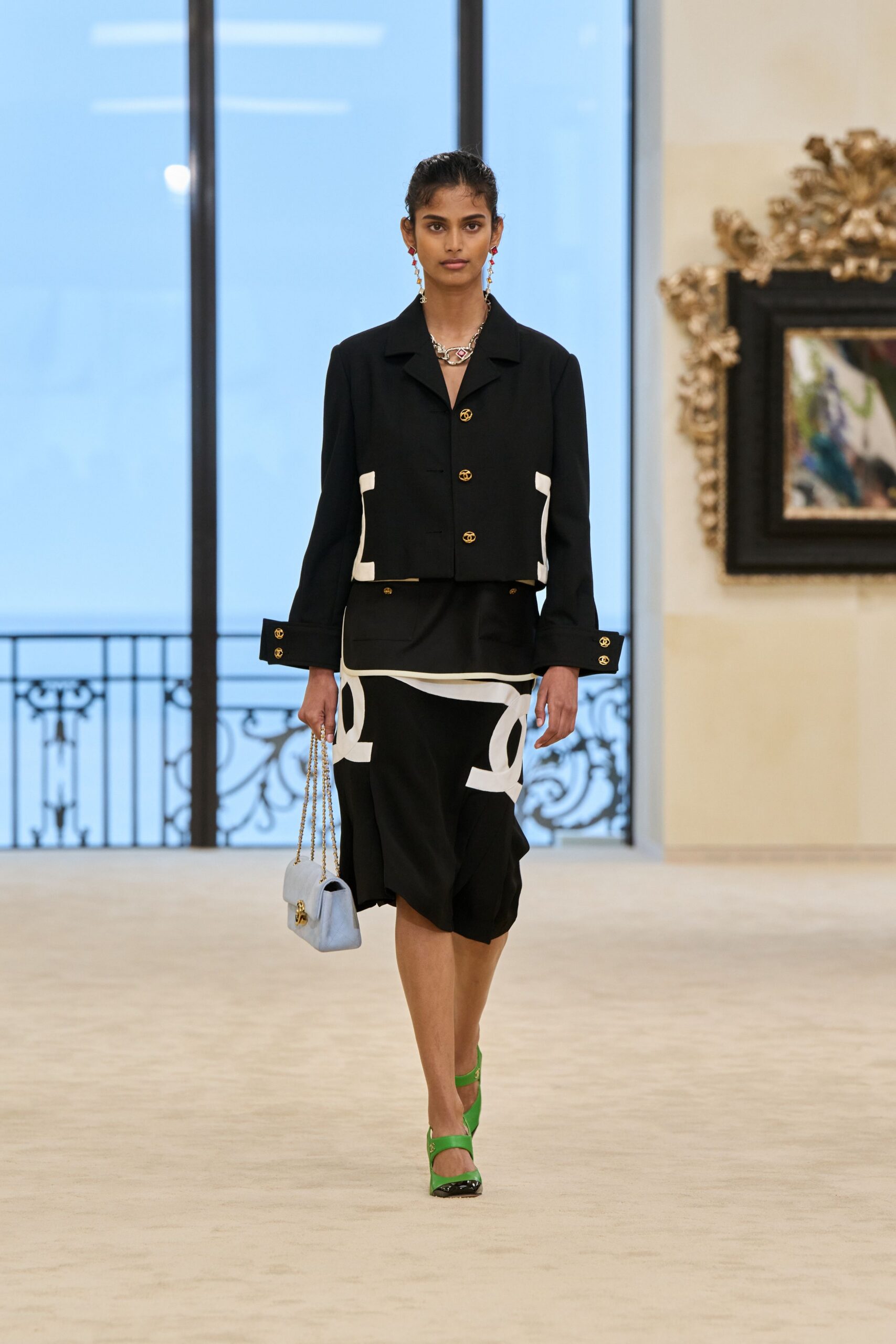 black jacket and asymmetric skirt