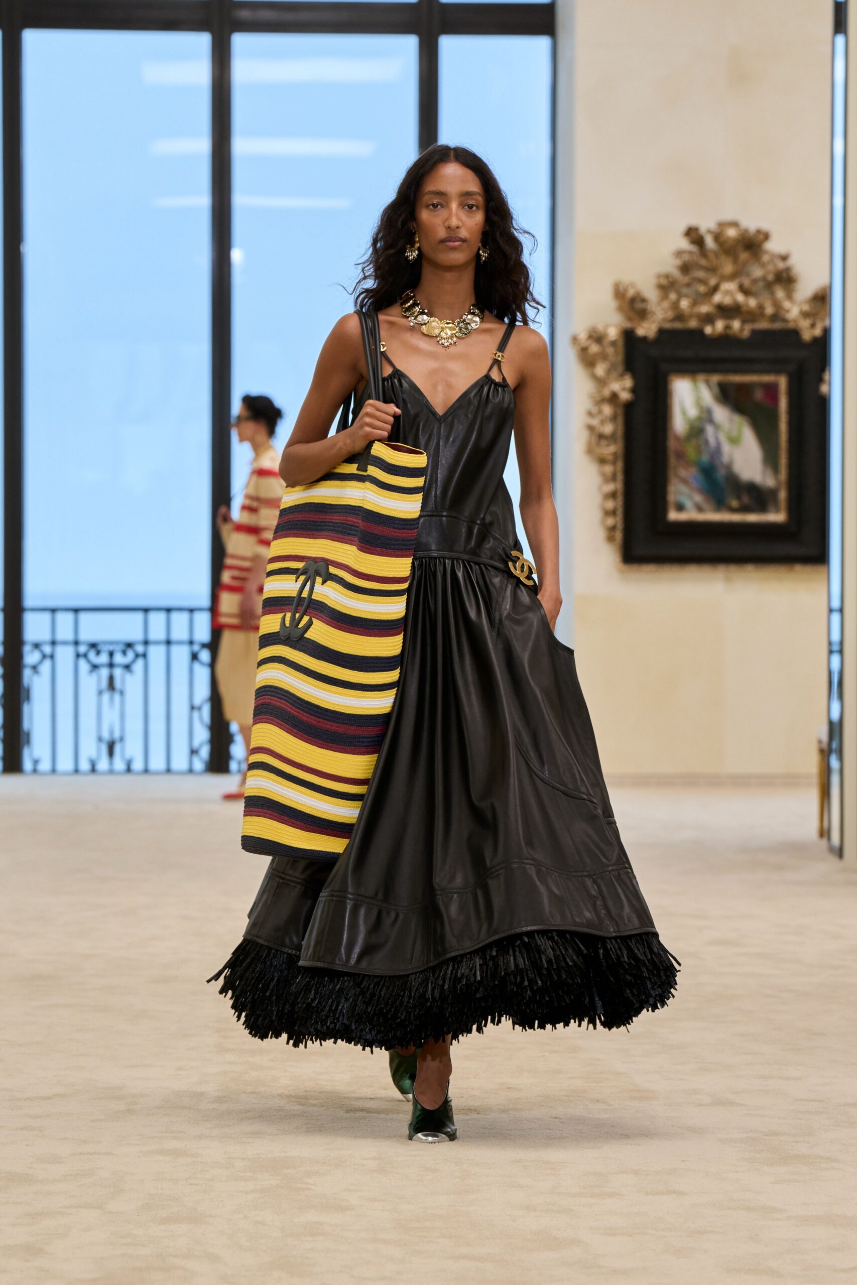 black leather sleeveless v-neck fitted tiered fringed dress