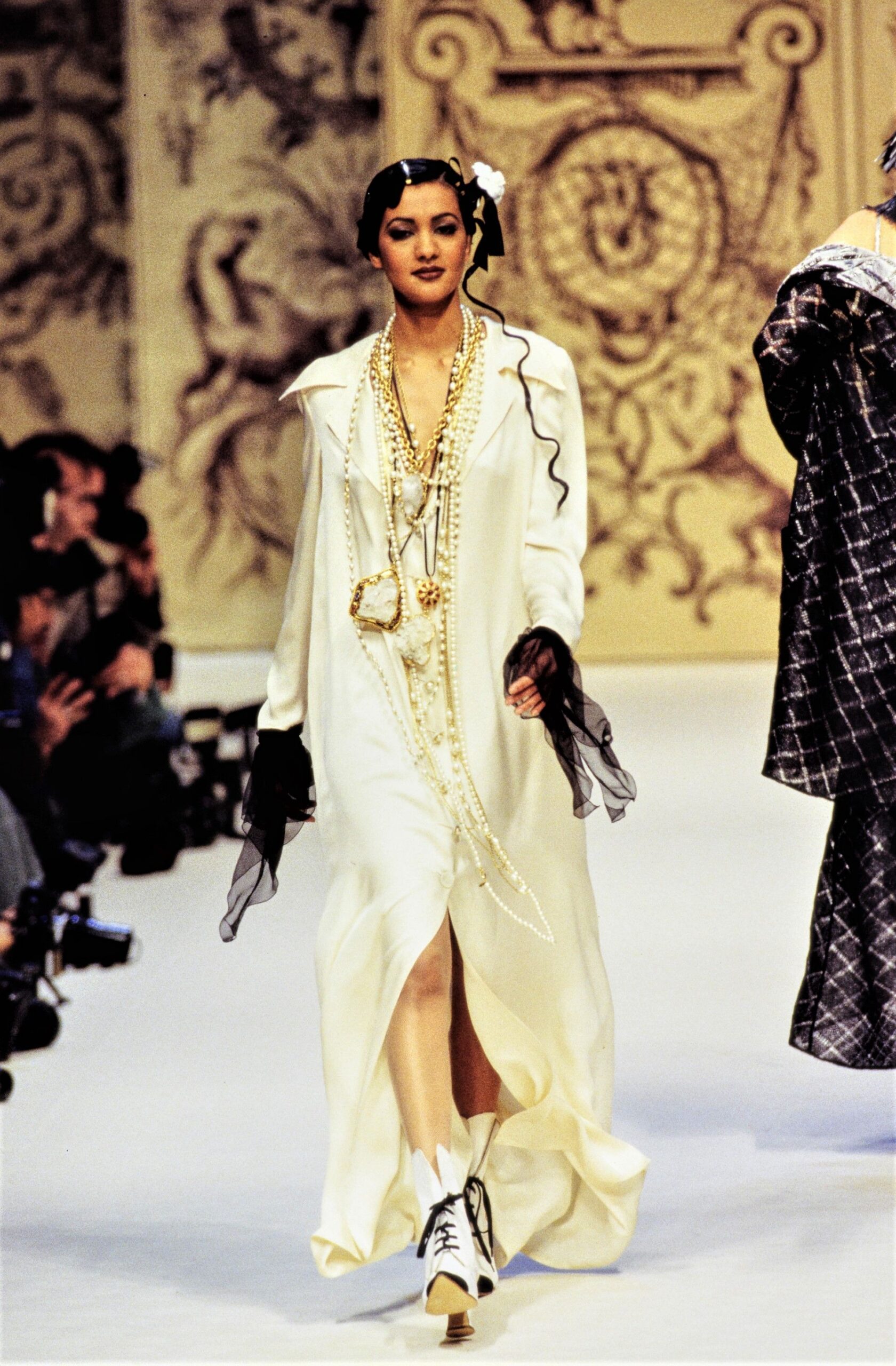 white silk long-sleeve gown