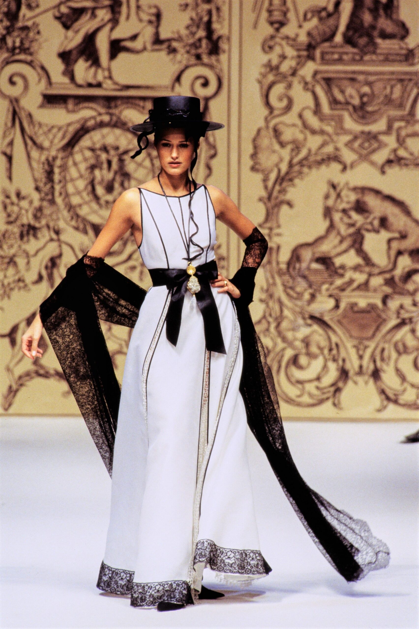 white silk sleeveless v-neck fitted layered belted gown