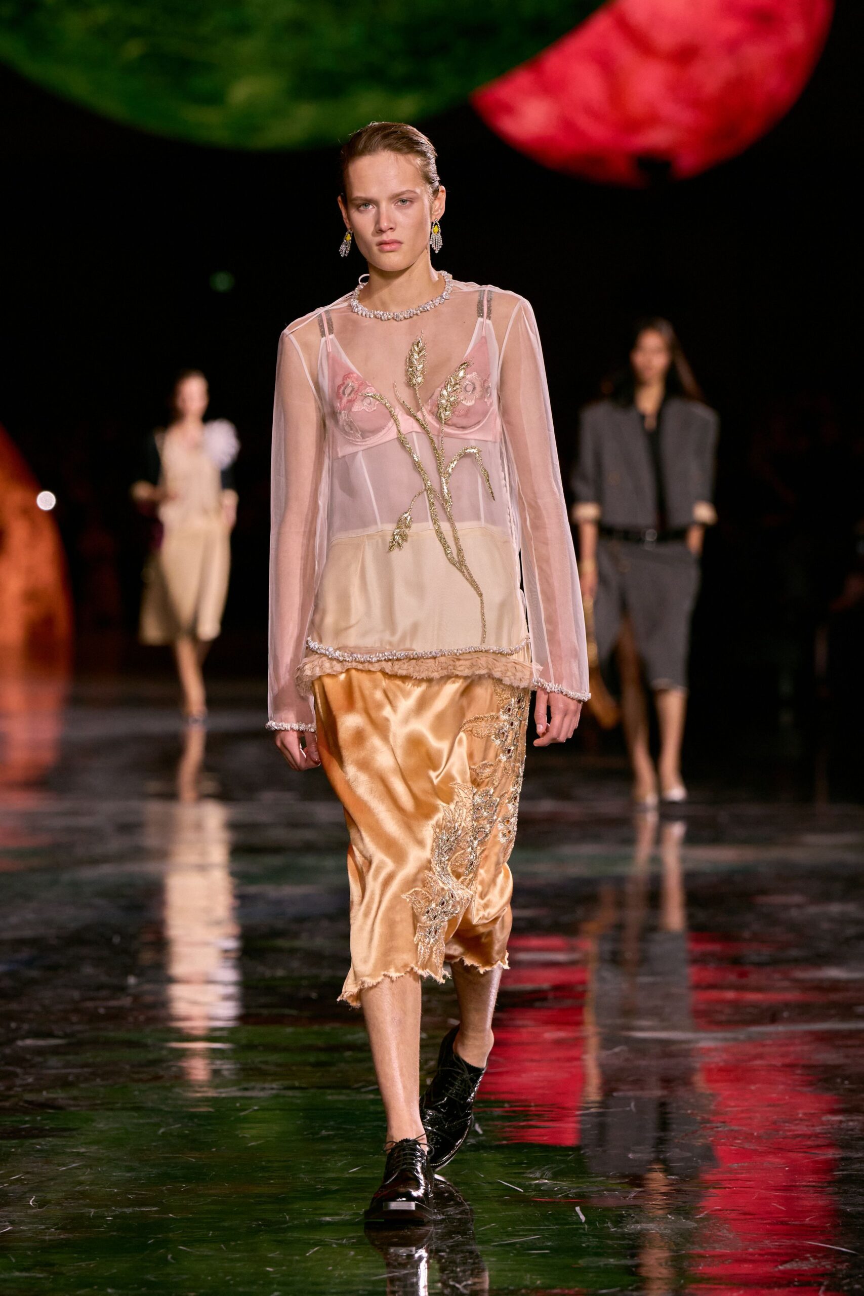 pink sheer embroidered top with gold skirt