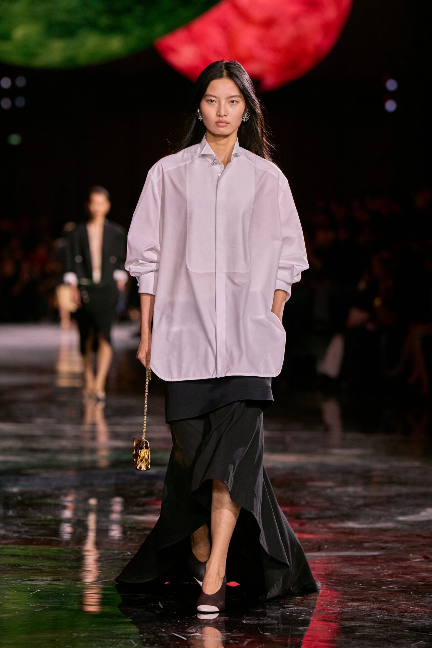white silk relaxed shirt with black skirt