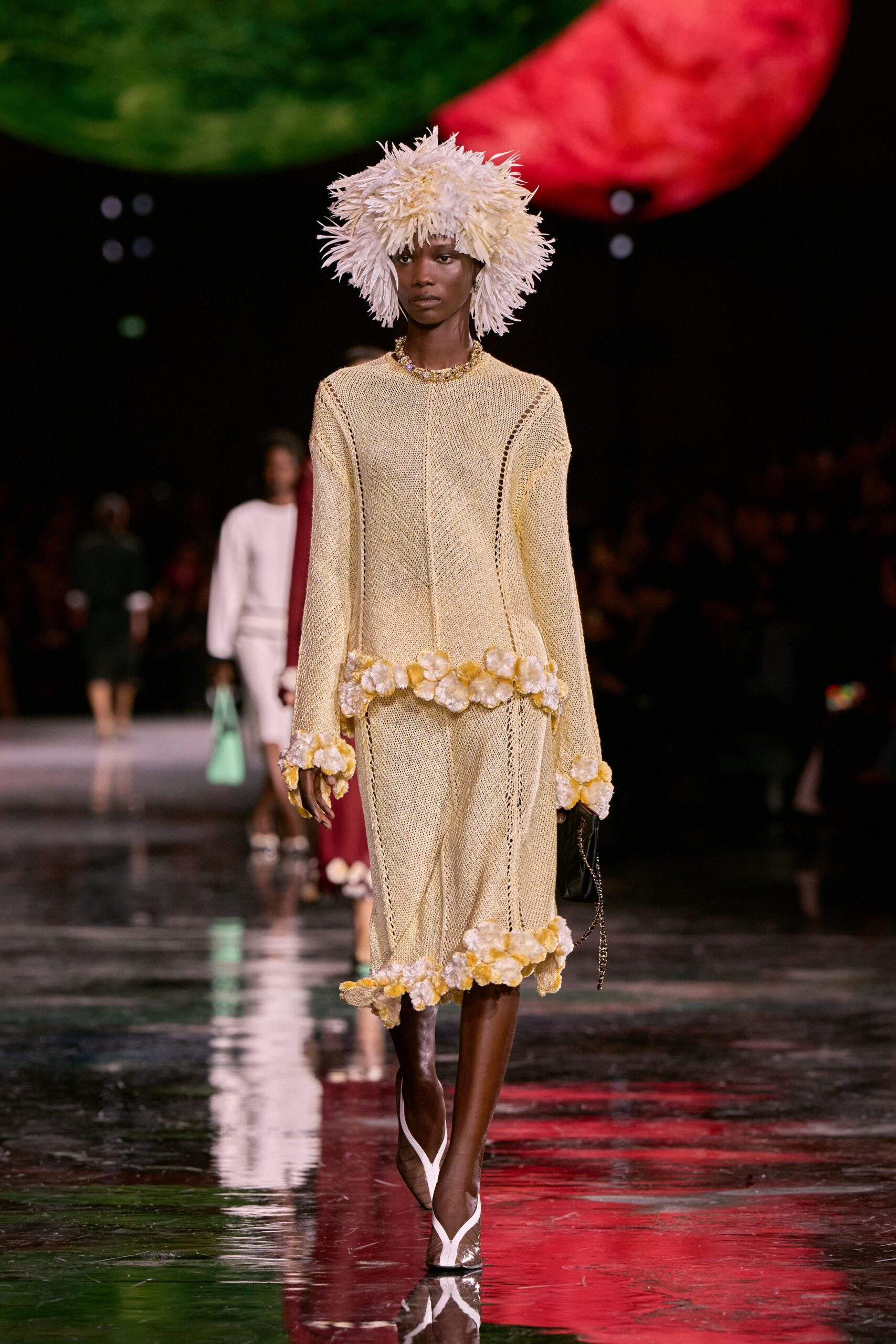 white feather embellished hat