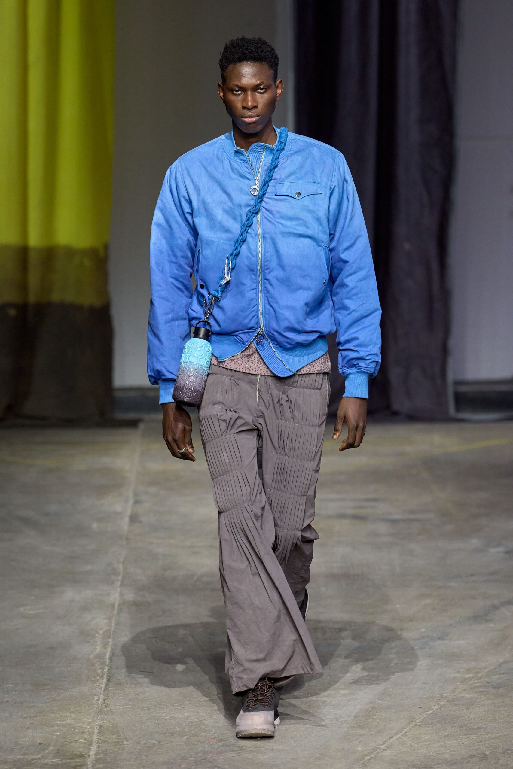 blue jacket with gray pants