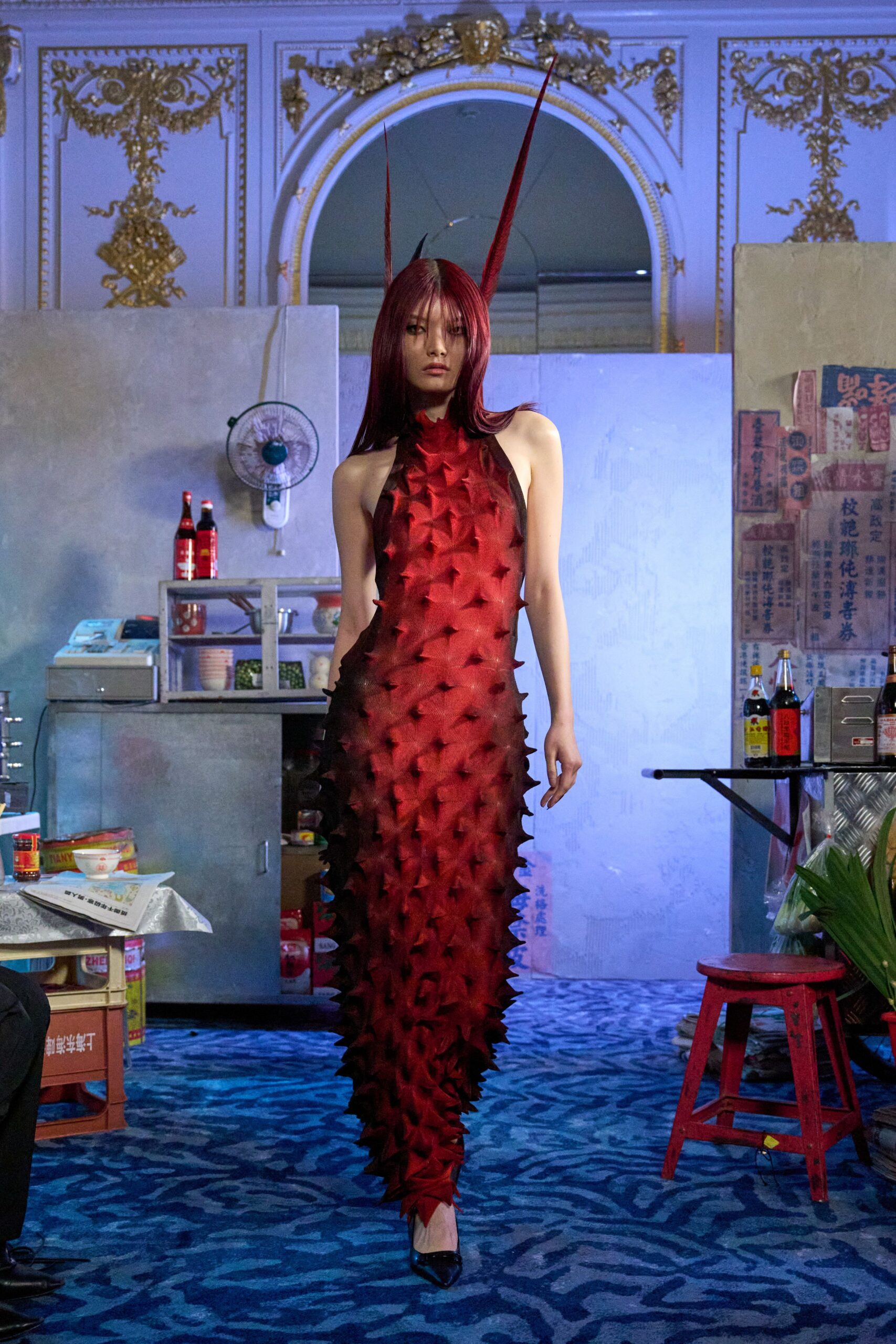 red fitted gown with pleats