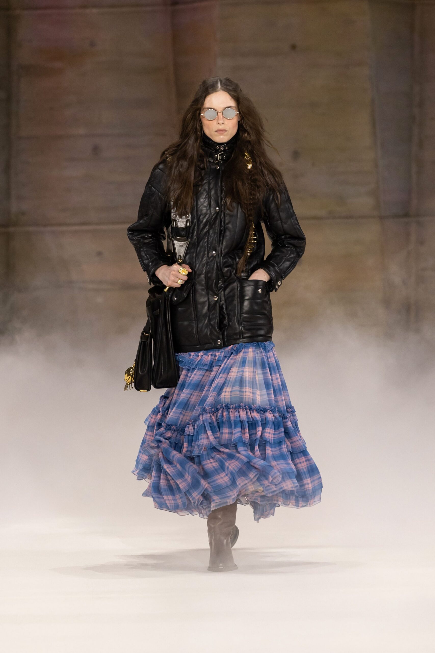 black leather jacket with blue tiered skirt