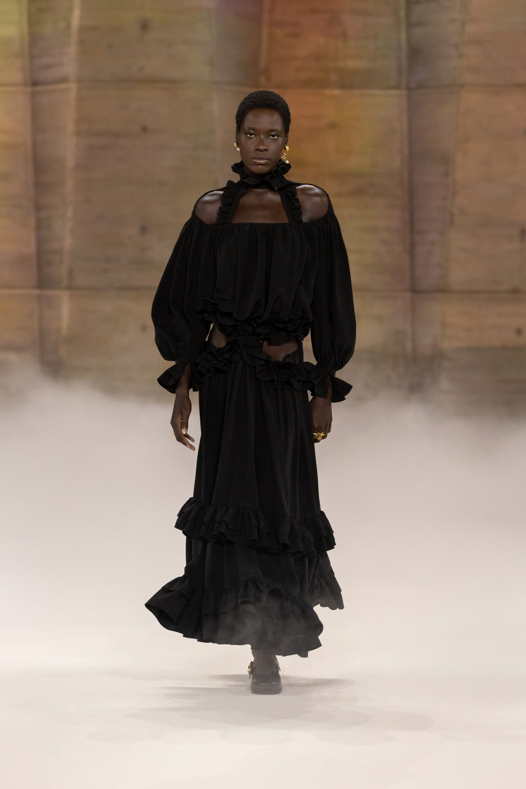 black cotton sleeveless off-shoulder fitted ruffled layered dress