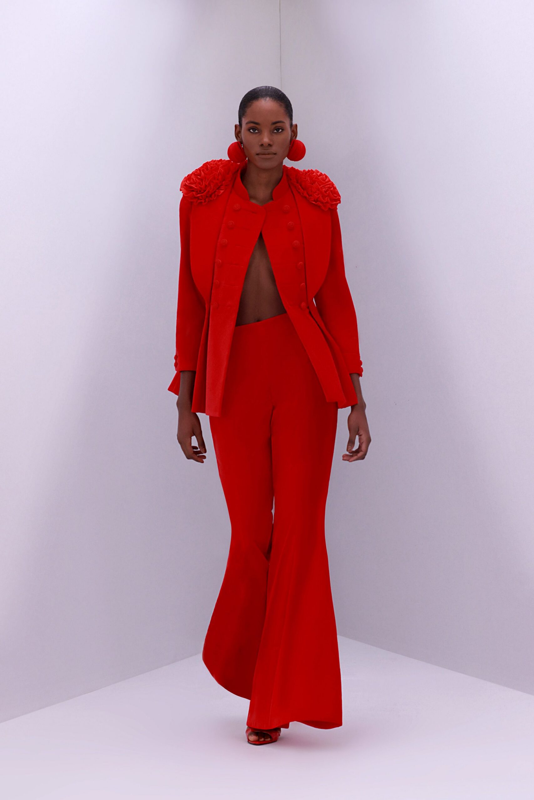 red long-sleeve collared tailored buttoned blazer