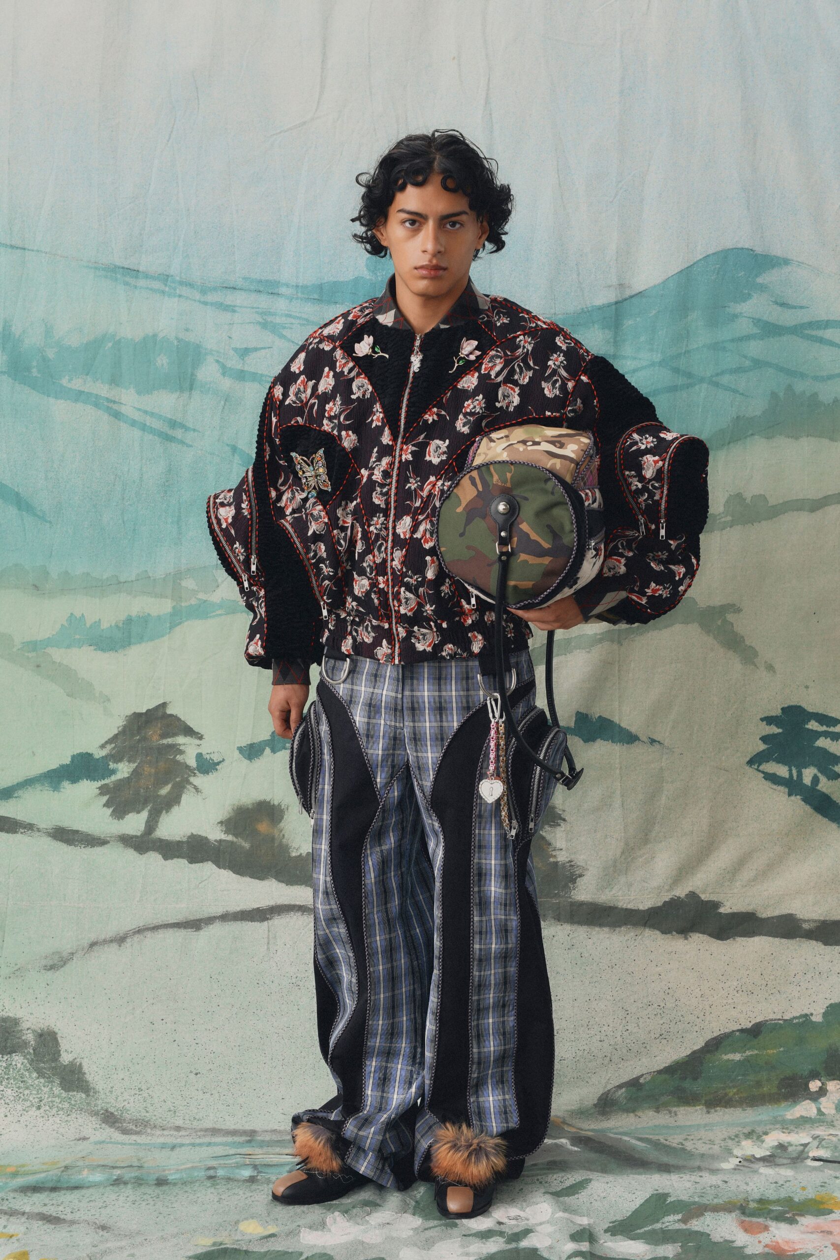 embroidered black jacket with checked pants